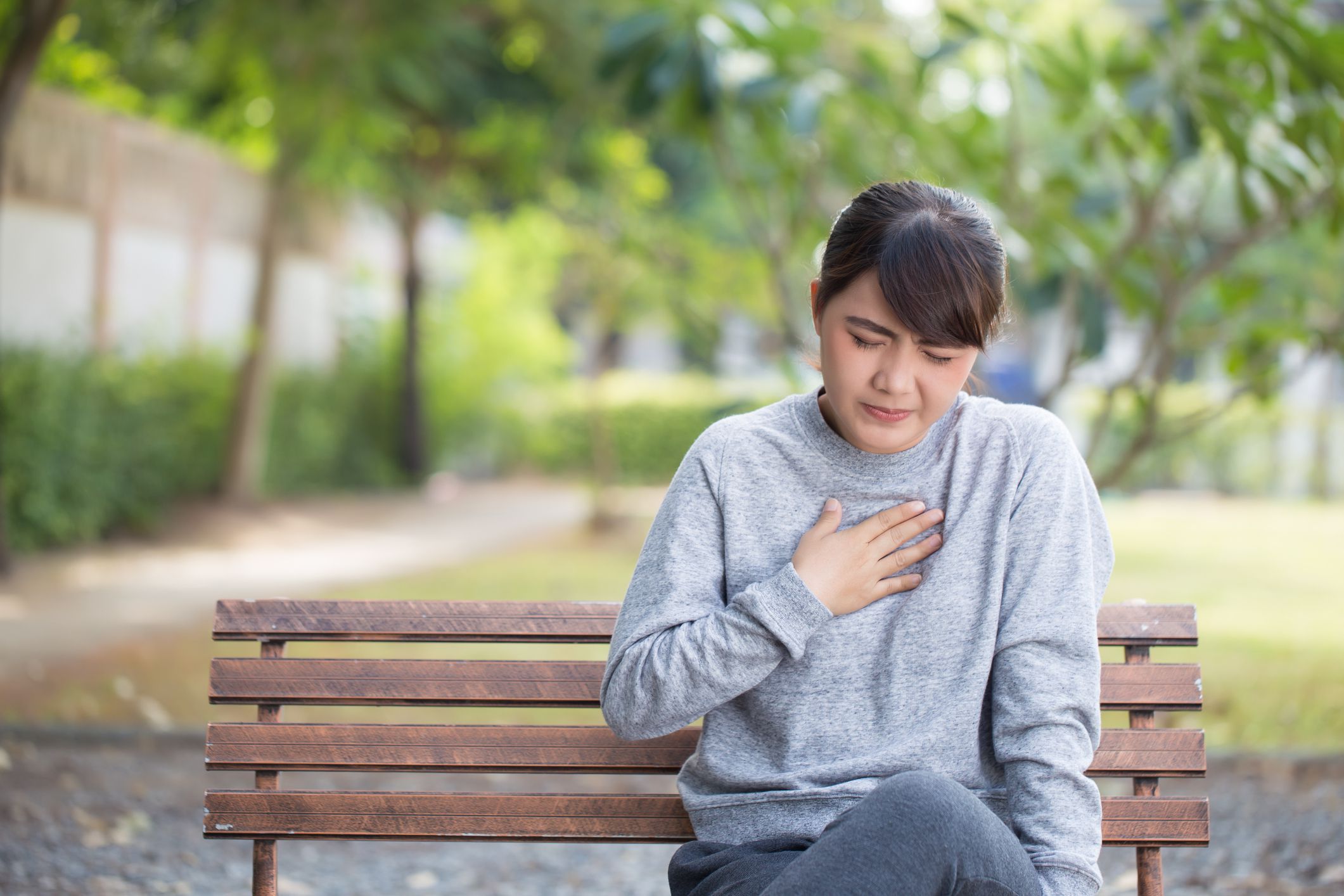 Woman has reflux acids at park