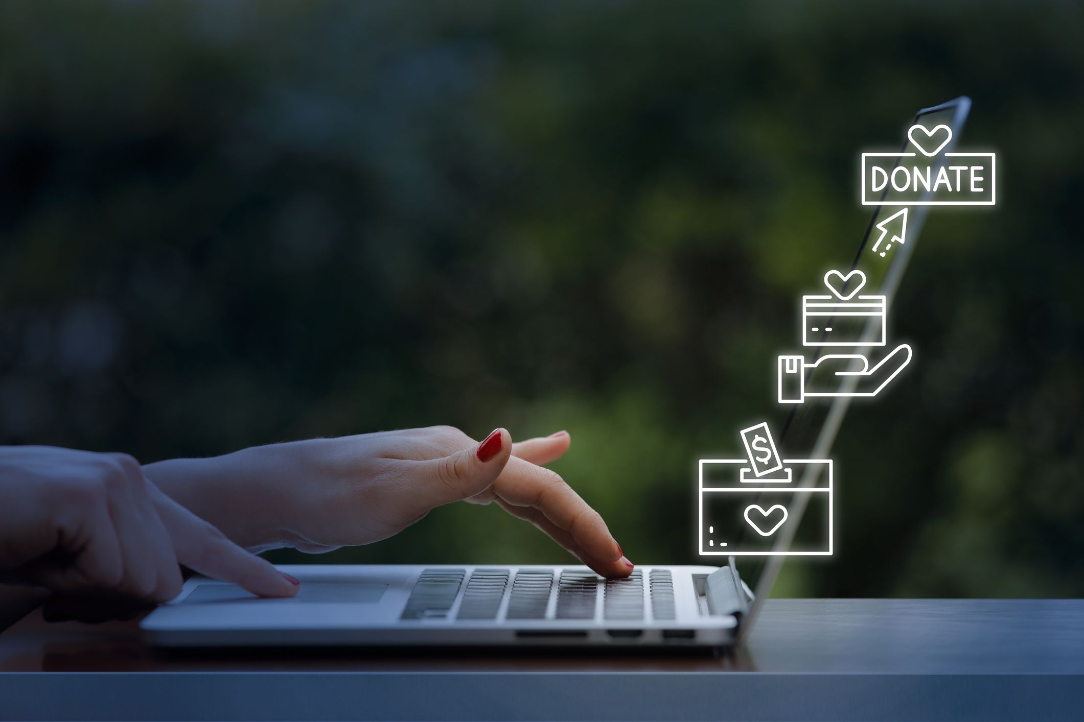 Woman using laptop with donate icons