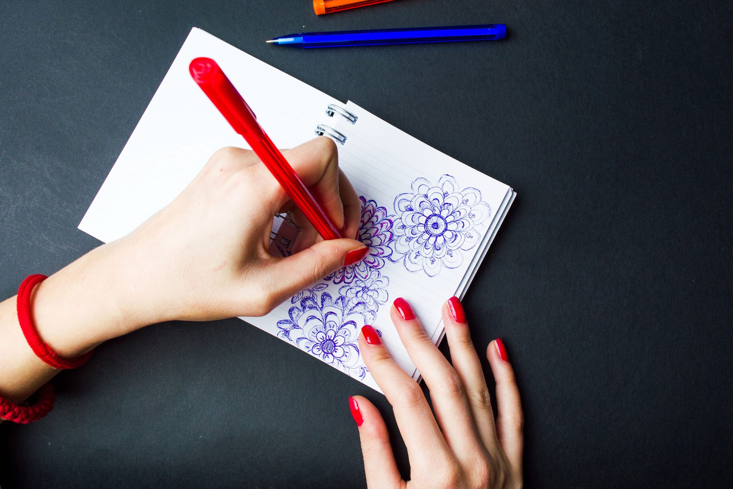 Left-handed drawing, notebook, doodles