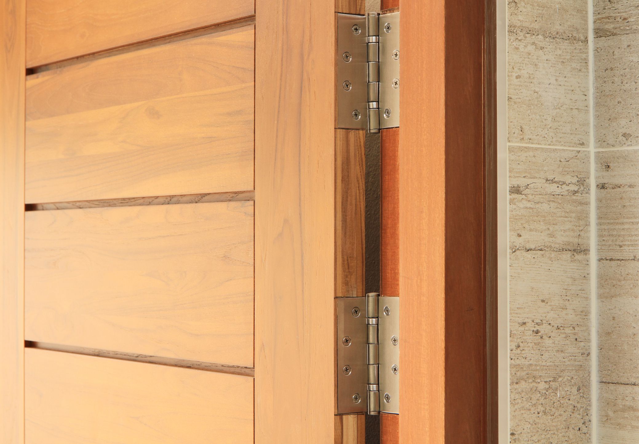 Wooden door with hinge