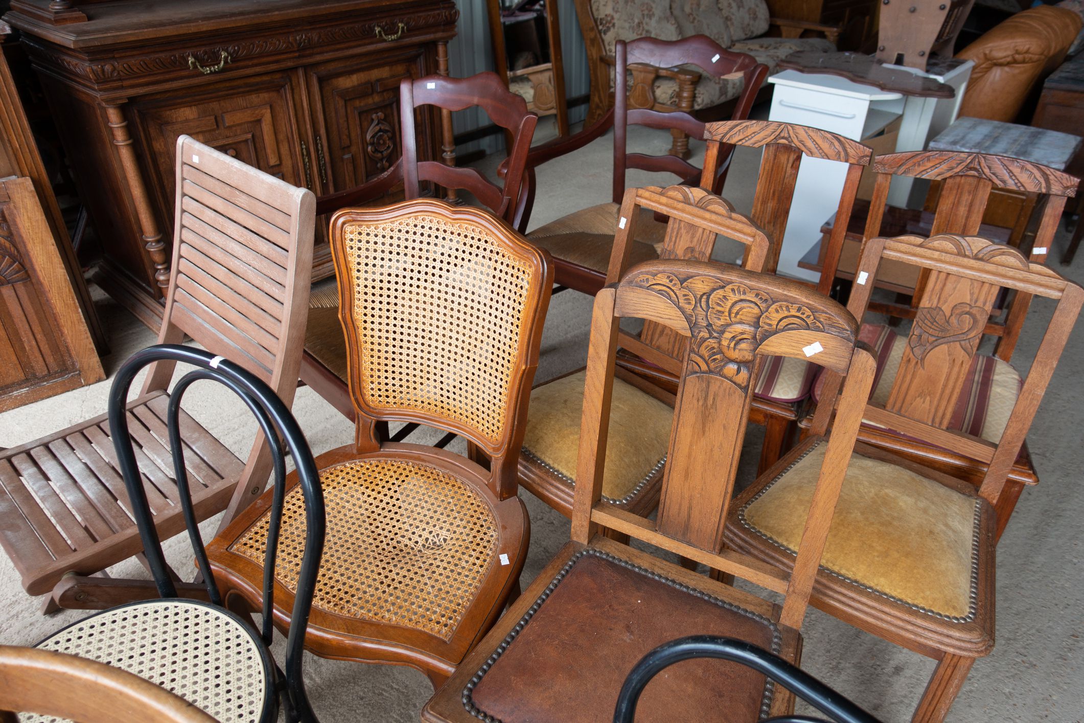 Vintage chairs in emmaus thrift shop