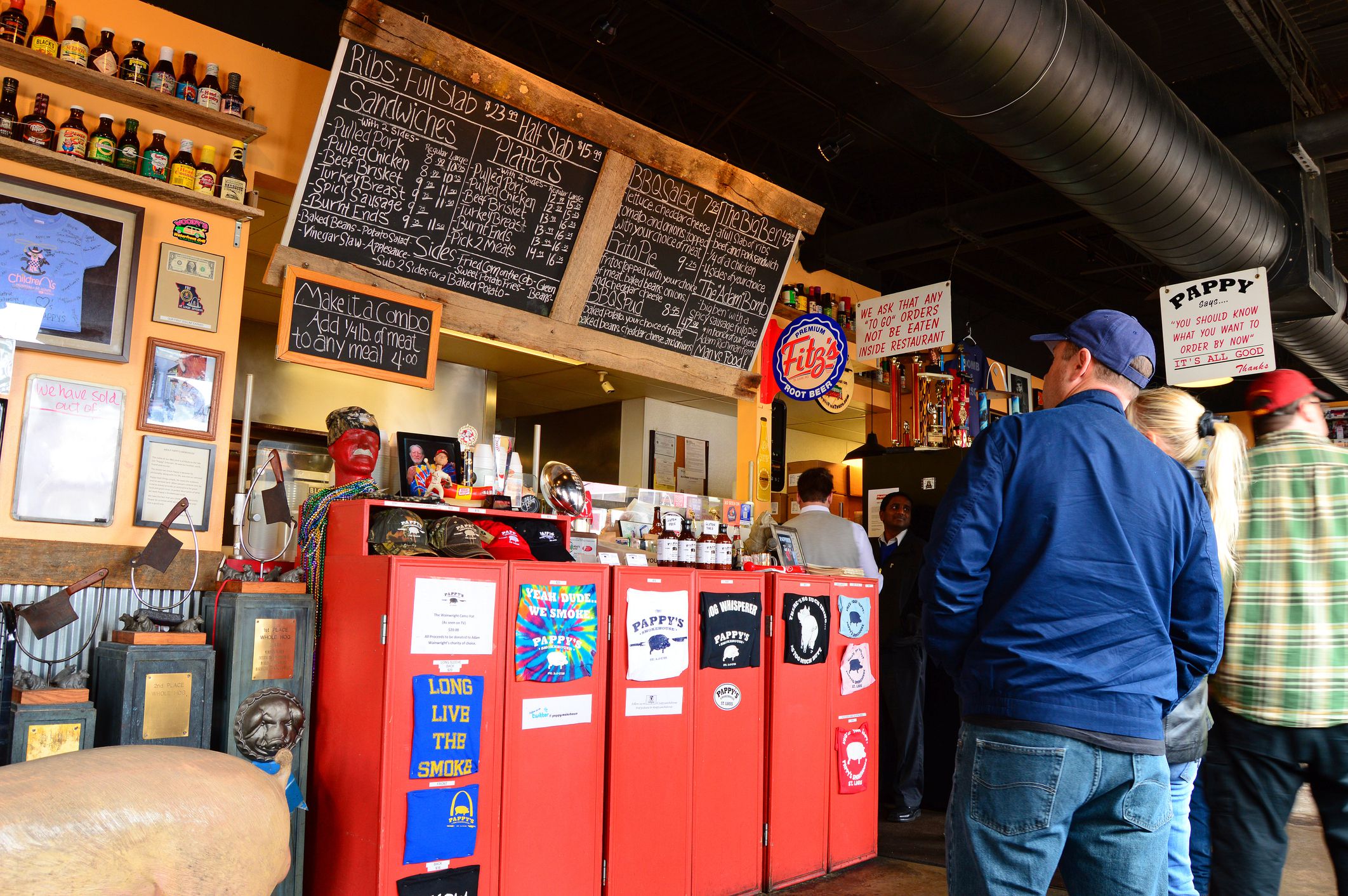 St Louis, MO, USA February 26 A lunch time crowd examine the menu at a rib joint in St Louis, Missouri