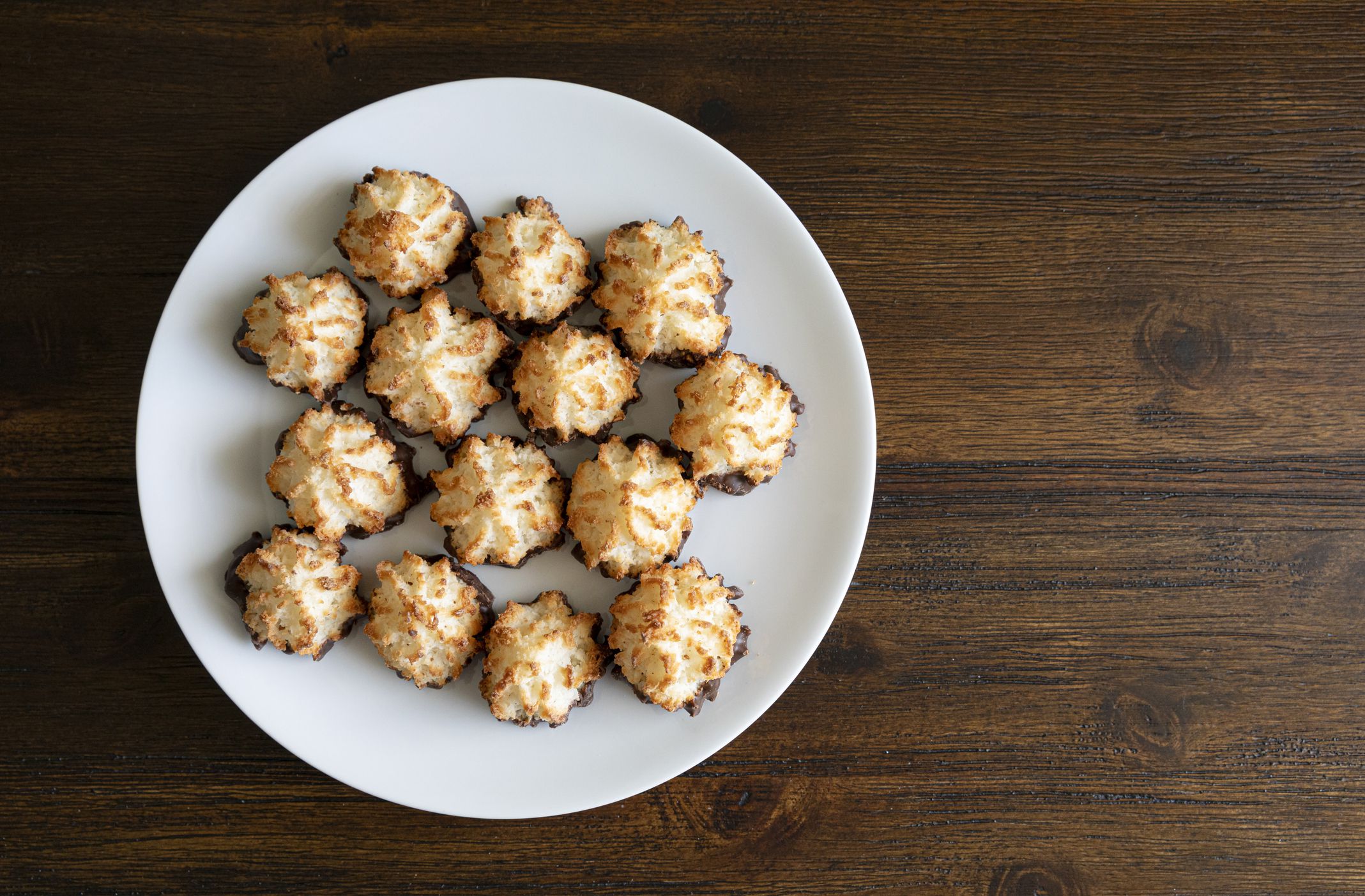 Plate with chocolate covered coconut macaroons