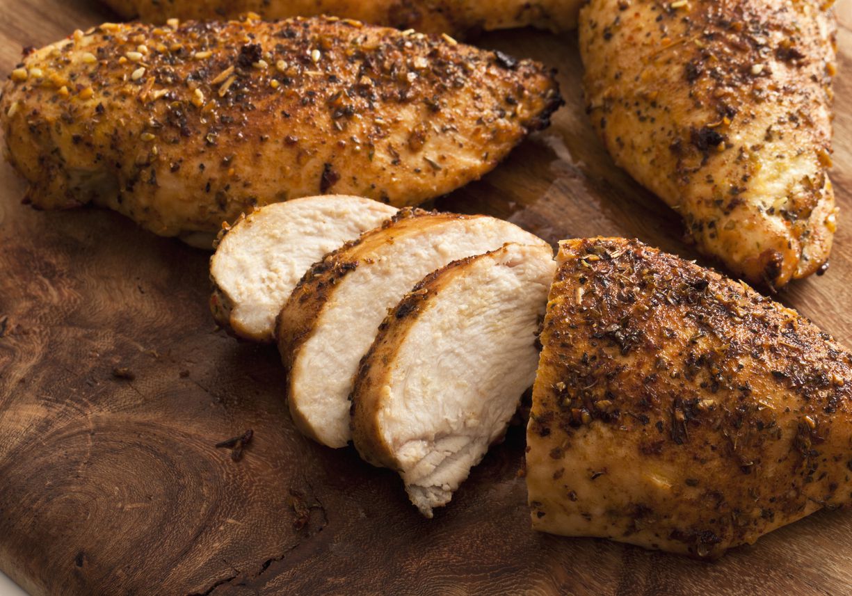 A few pieces of chicken that have been sliced up.