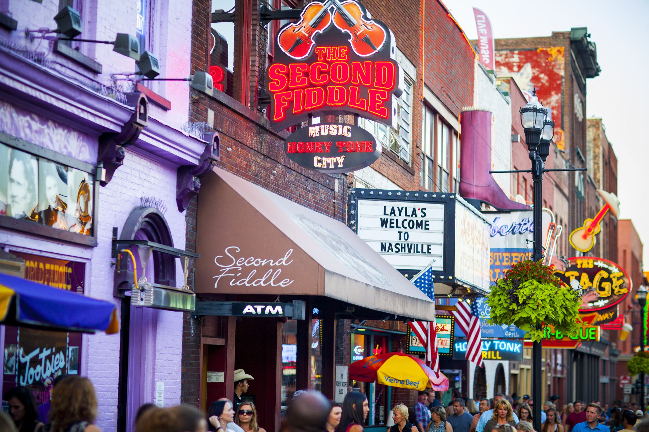 Nashville, United States - September 23, 2016: View of country western neon signs on Lower Broadway in Nashville, TN. The district is famous for its country music entertainment and bars.