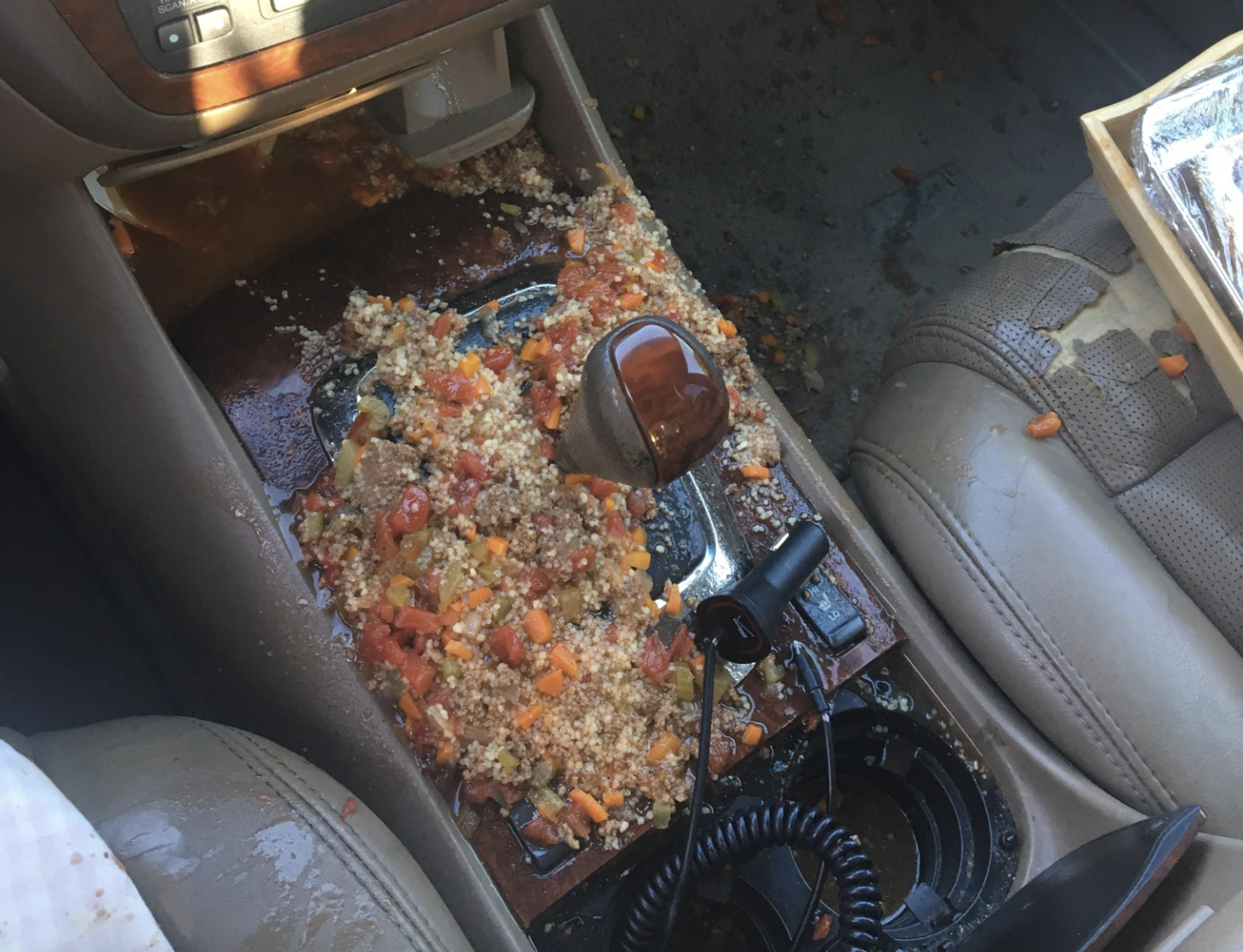 Spilled soup all over the front of a car