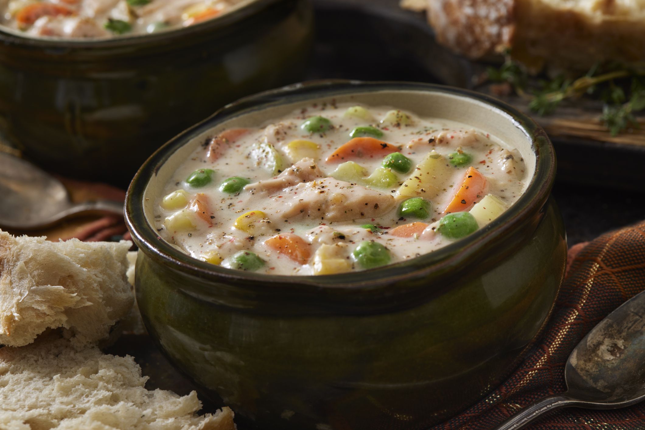 Creamy Leftover Roast Turkey Pot Pie Soup with Peas, Carrots, Potatoes and Crusty Bread
