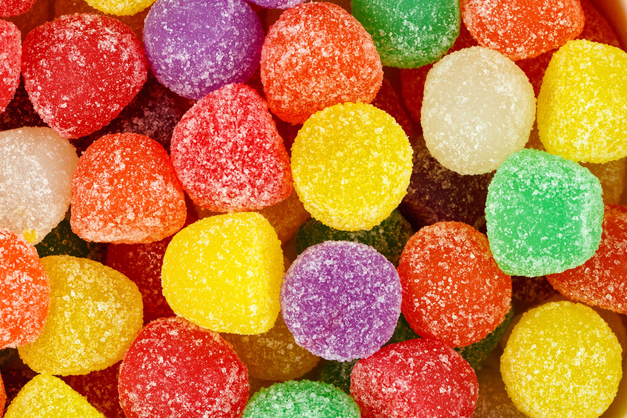 Close up of assorted multicolored gum drops.