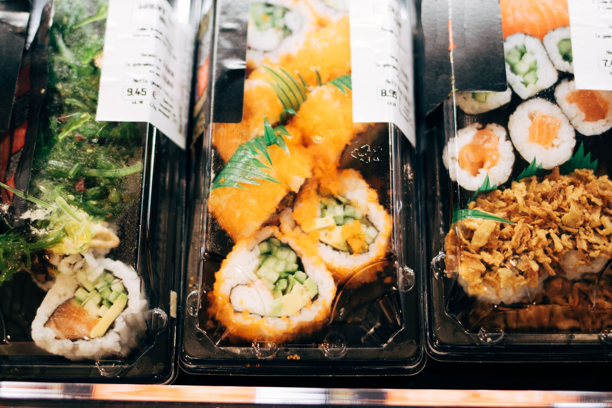 luxury grocery store - fresh packed sushi for sale in shop