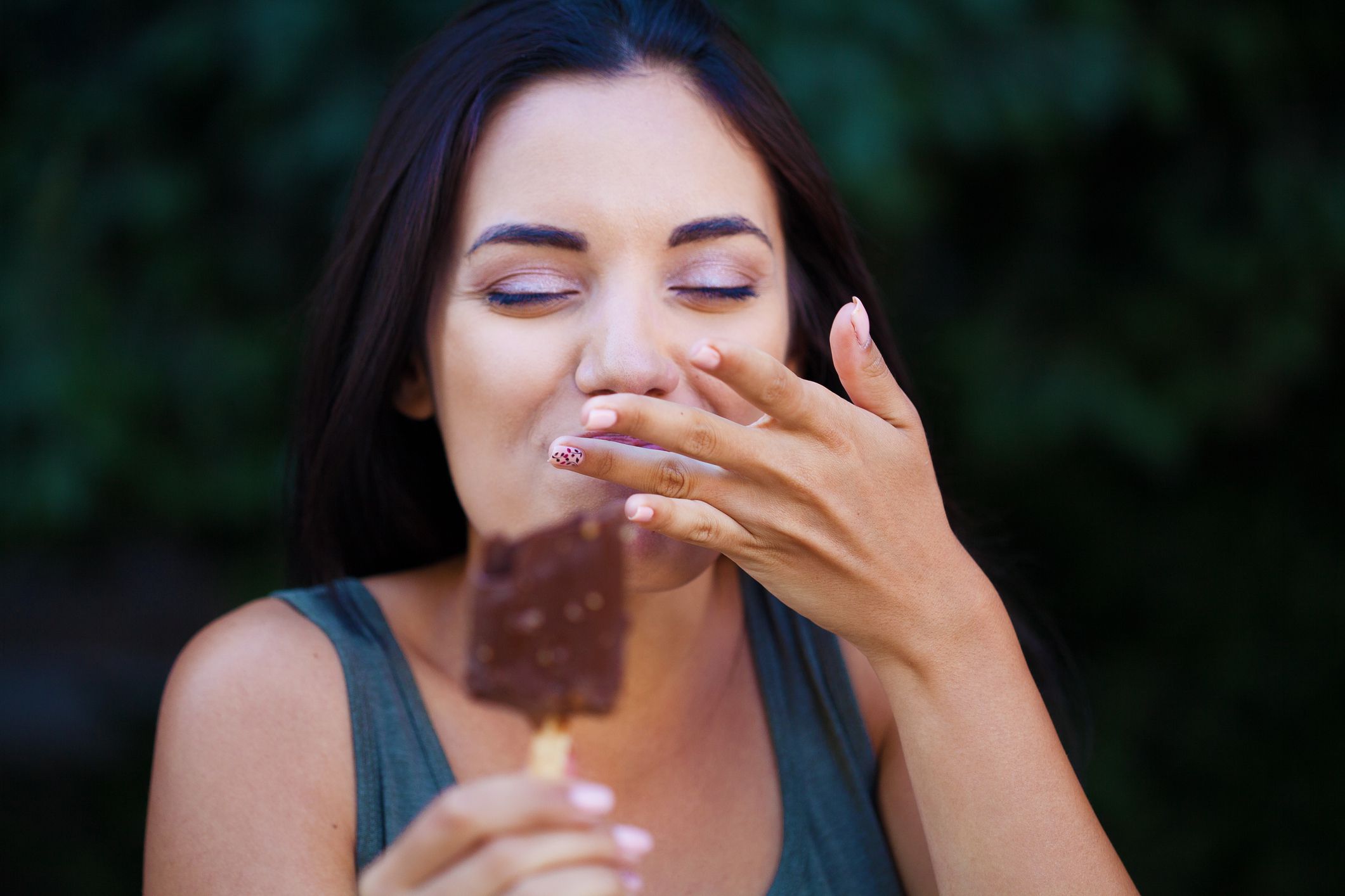 Beautiful woman eating ice-cream