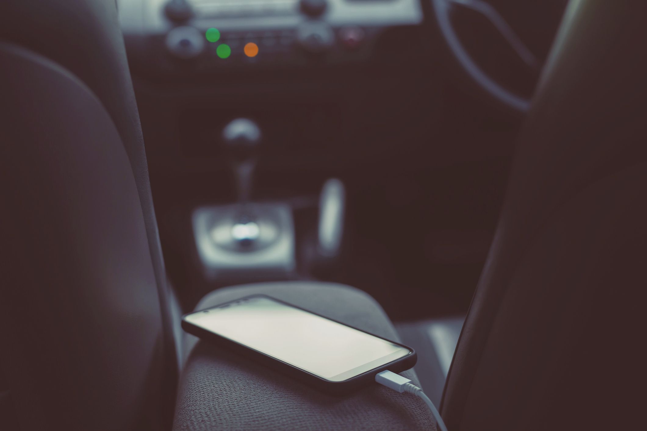 Close-Up Of Mobile Phone In Car