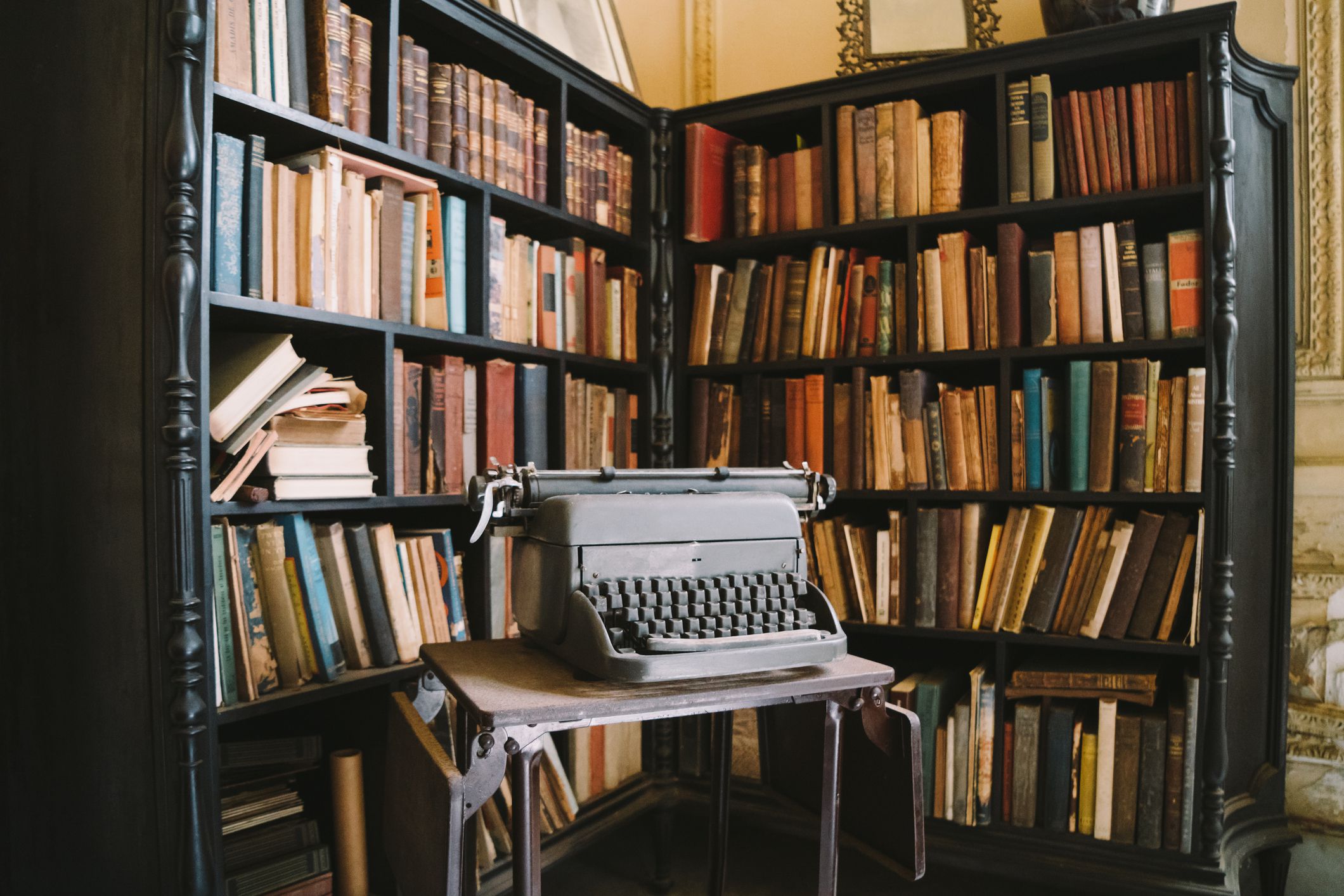 Interior of old Villa in Vedado, suburbs of Havana. Library area desk with typewriter