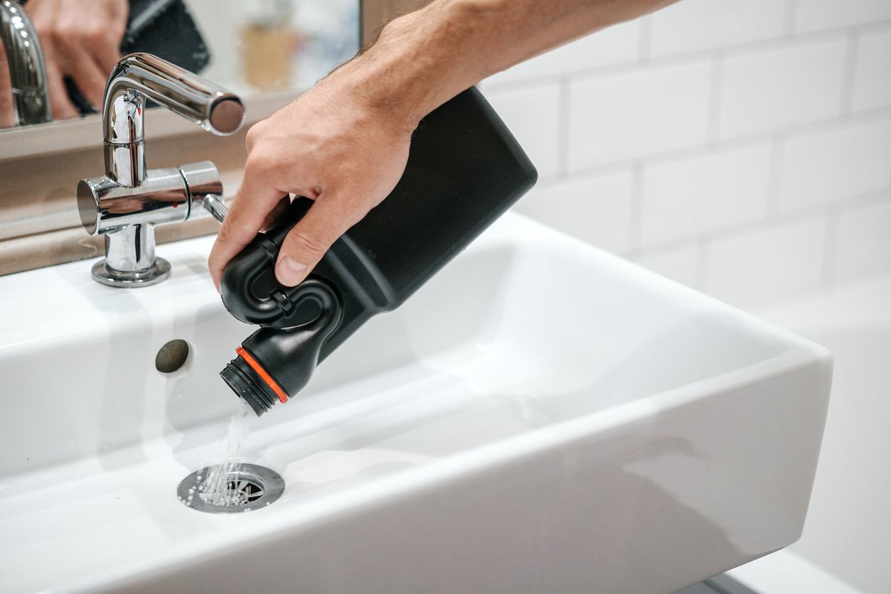 clean drain with chemicals