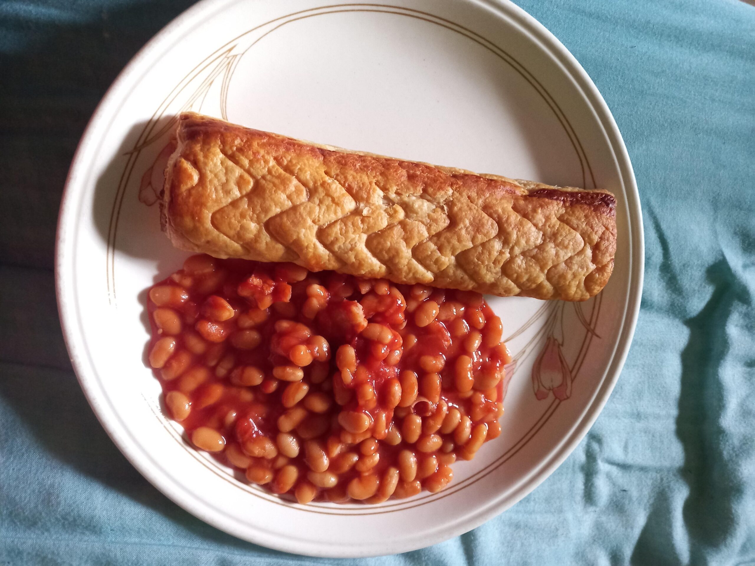 sausage roll and beans