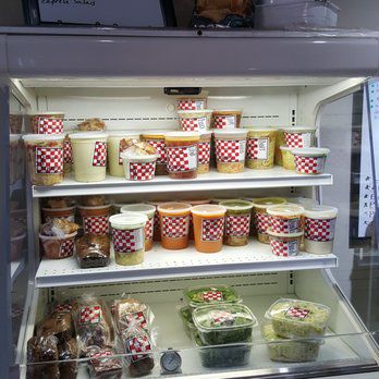an open refridgerator full of soup