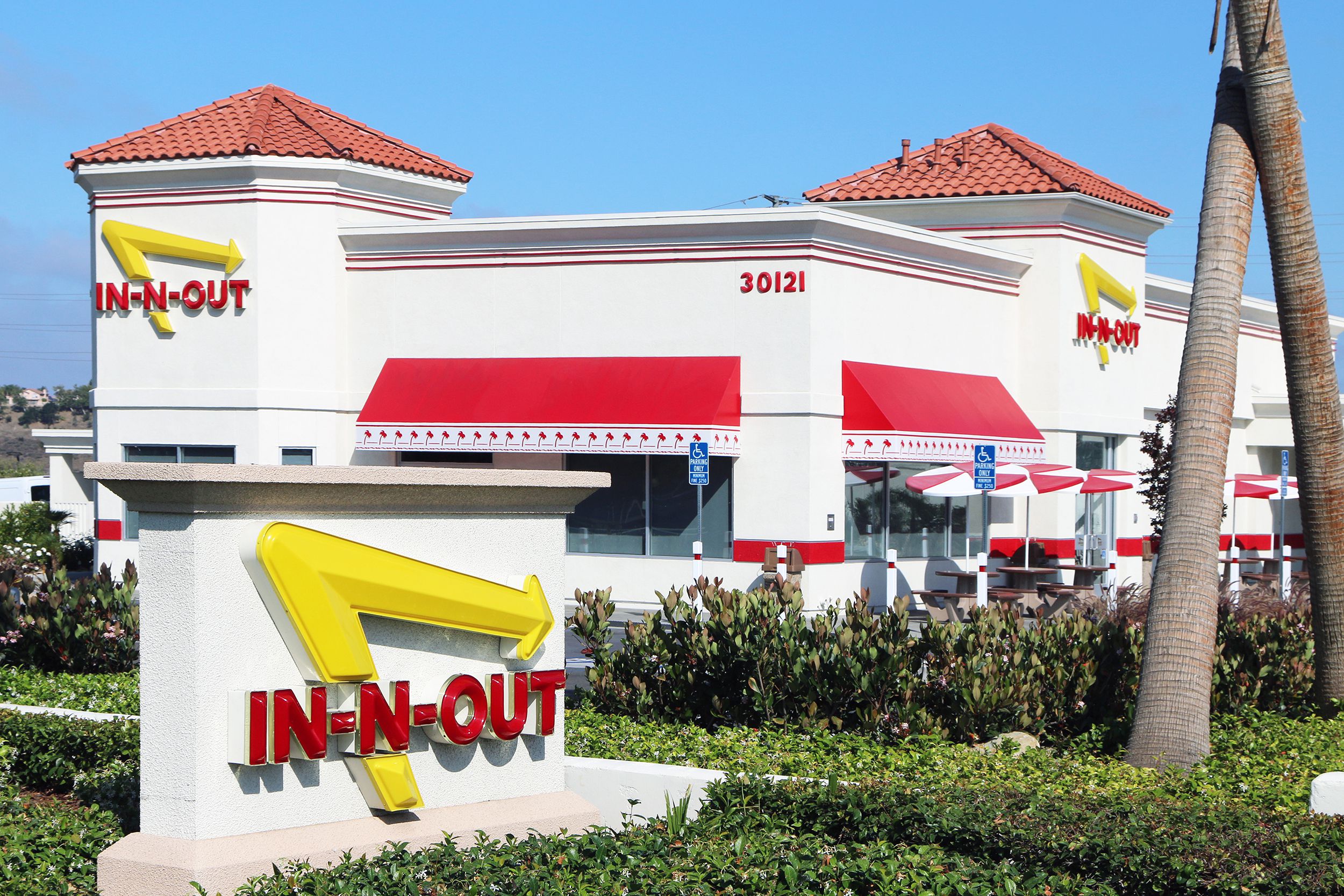 Exterior of an In-N-Out Burger restaurant in Orange County, California on a sunny day