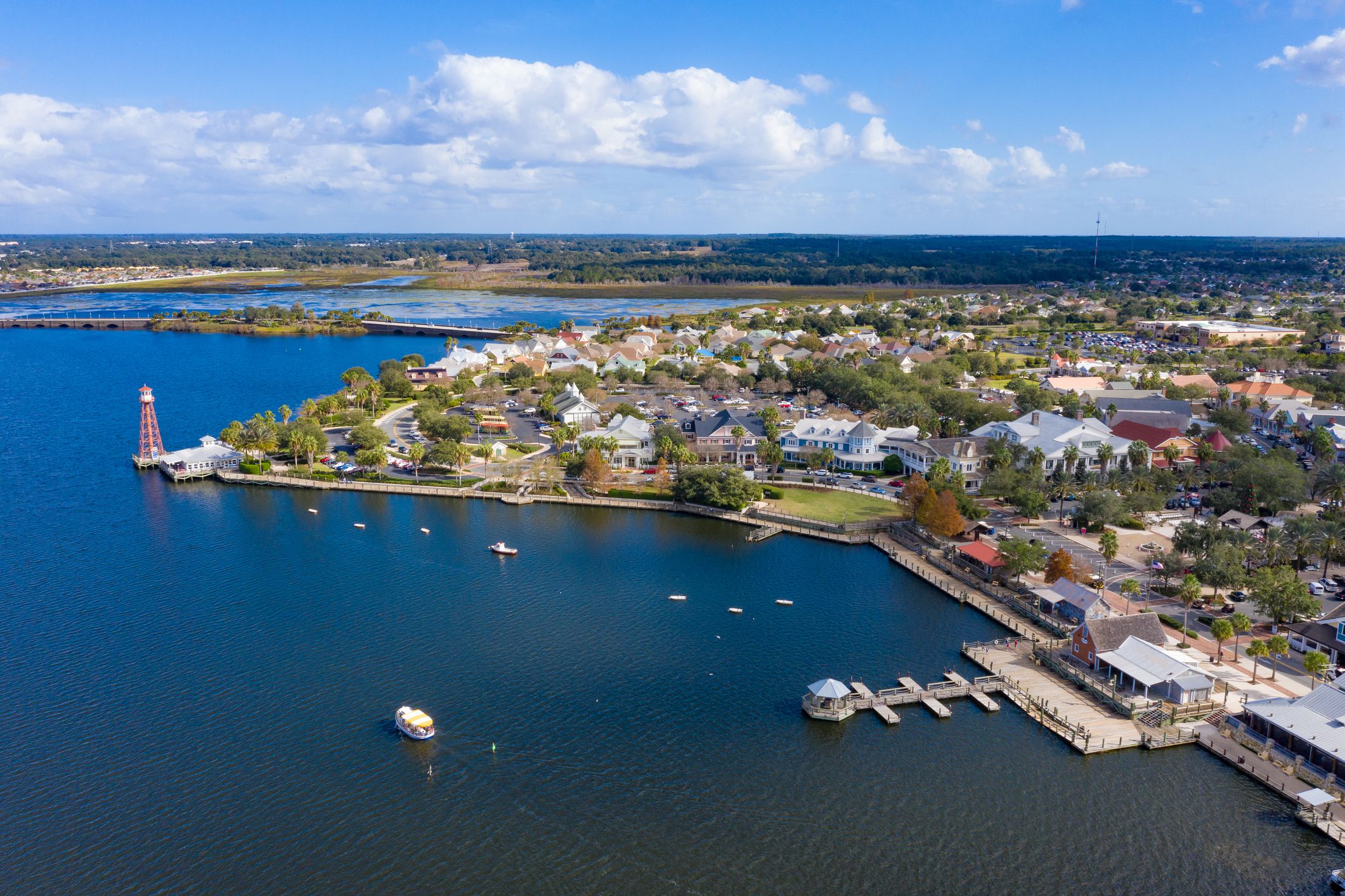A lighthouse and New England-style harbor on a lake in the retirement community of The Villages, Florida.