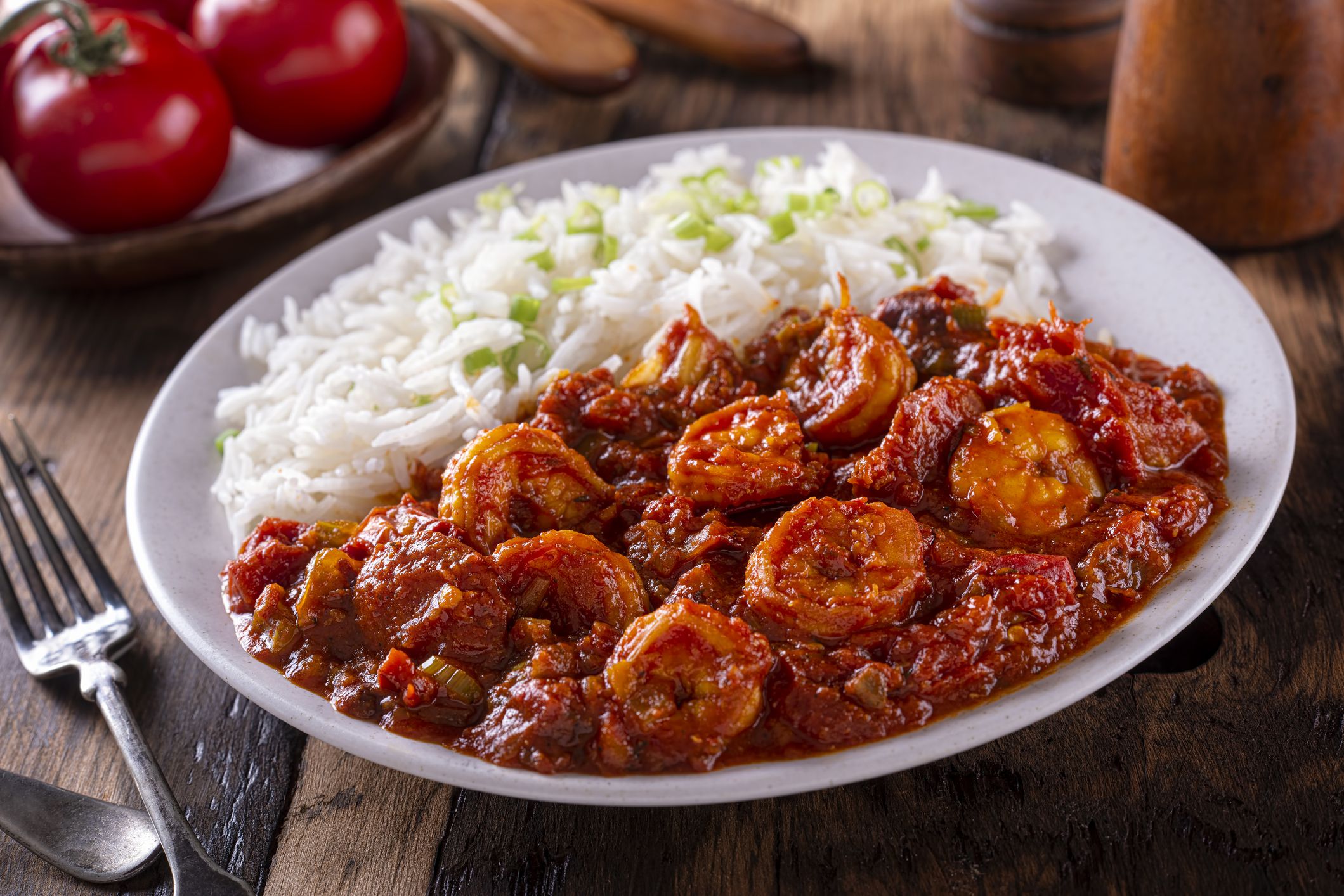 A plate of delicious southern style creole shrimp and sausage with white rice.