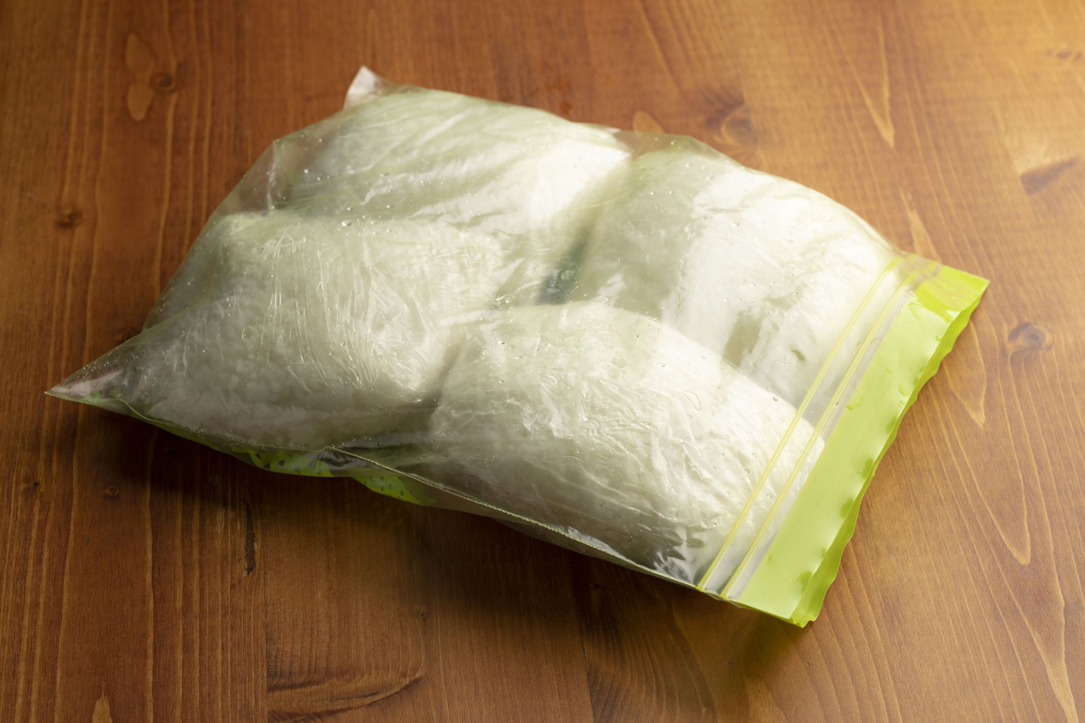 Freeze the white rice in the freezer and store it frozen.