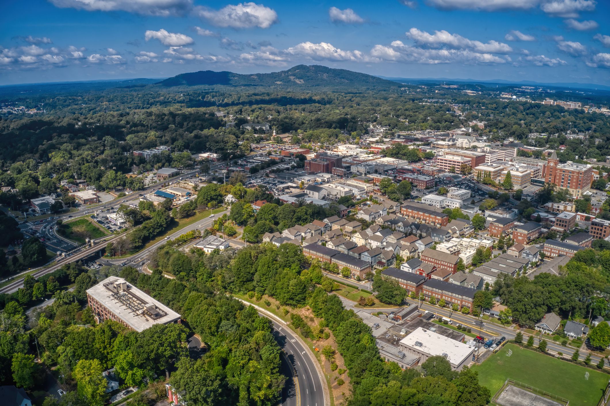 An aerial view of the Atlanta suburb of Marietta under a blue sky with tiny clouds in Georgia