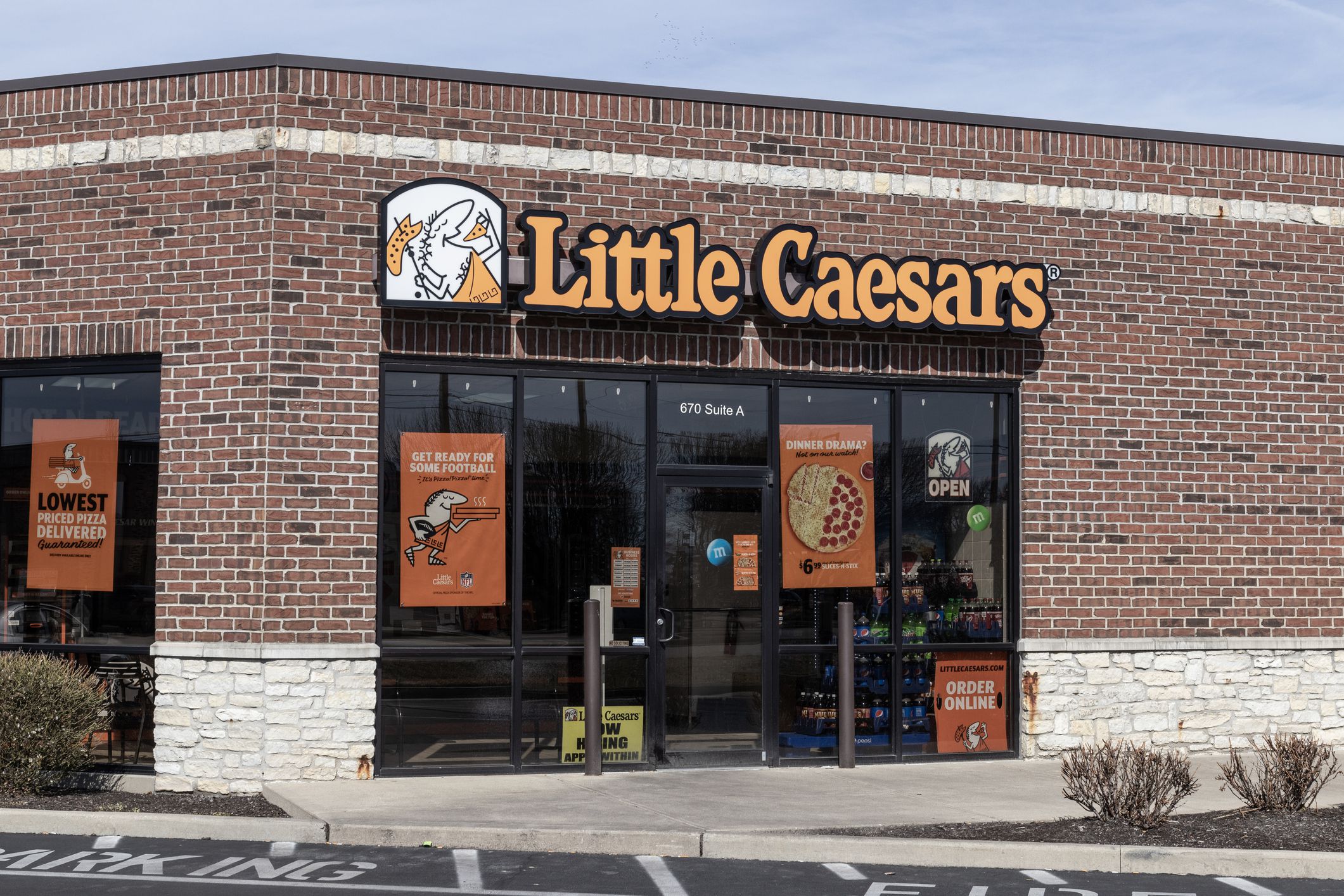 Greenwood - Circa February 2023: Little Caesars Pizza Franchise. Little Caesars is a carry-out chain featuring pizza and crazy bread.