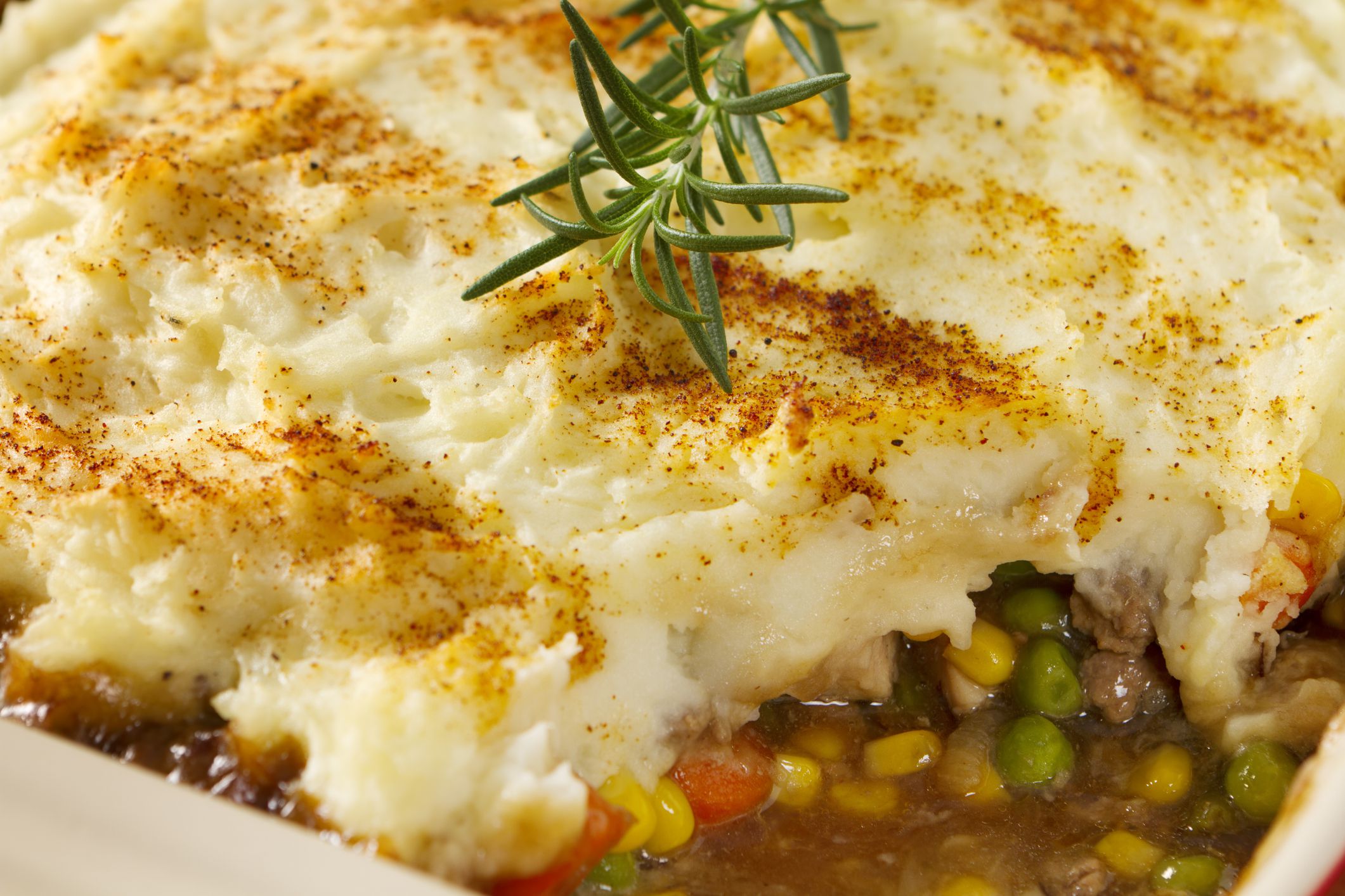 Beef and pork in a rich gravy with corn, peas, carrots, topped with mash potatoes and a dusting of paprika.
