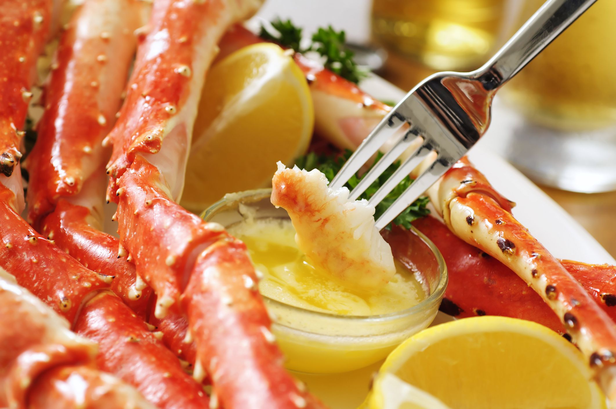 King crab legs with butter lemon and beers. Please see my portfolio for other food related images.