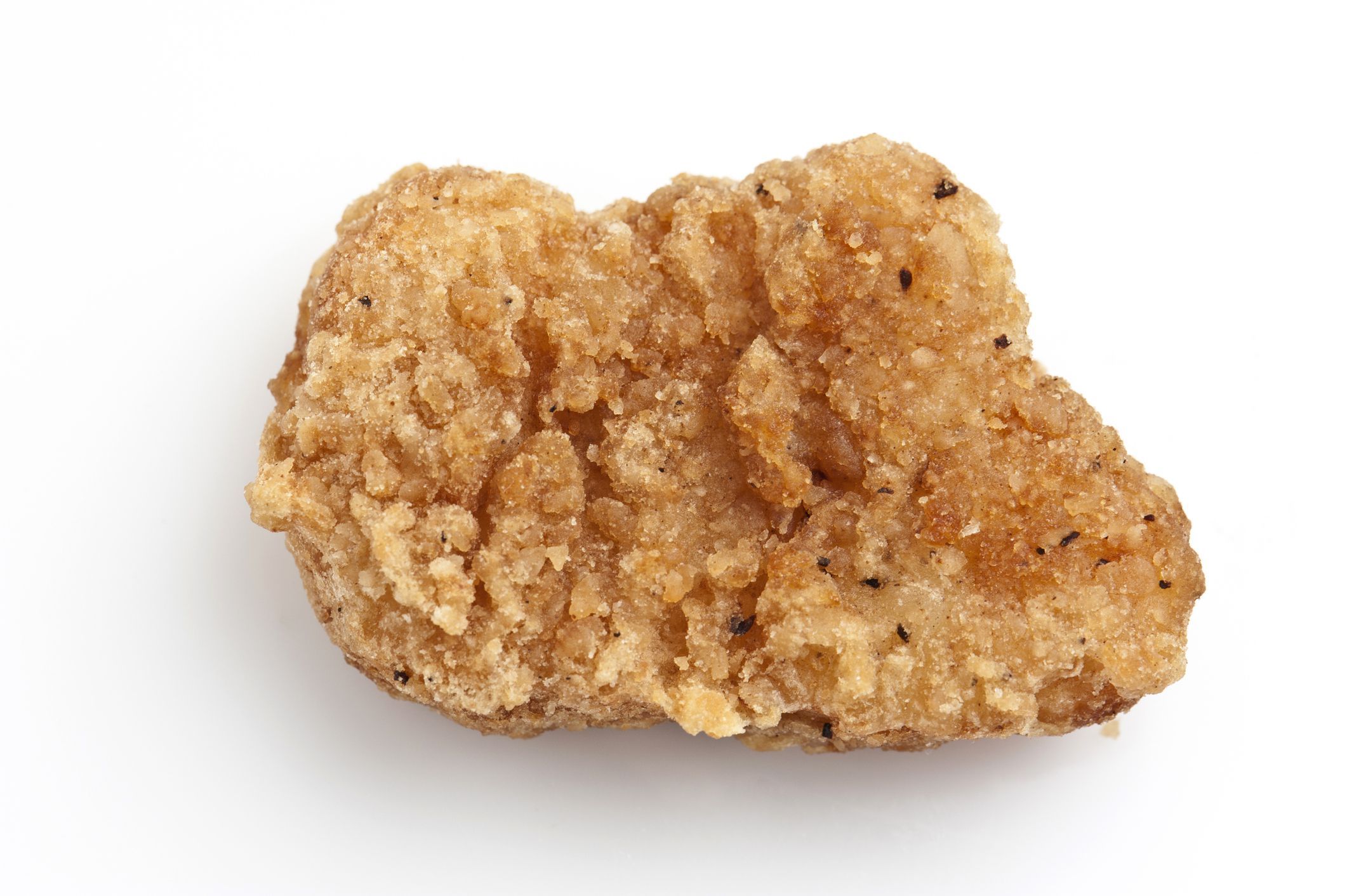 One Chicken nugget on white background