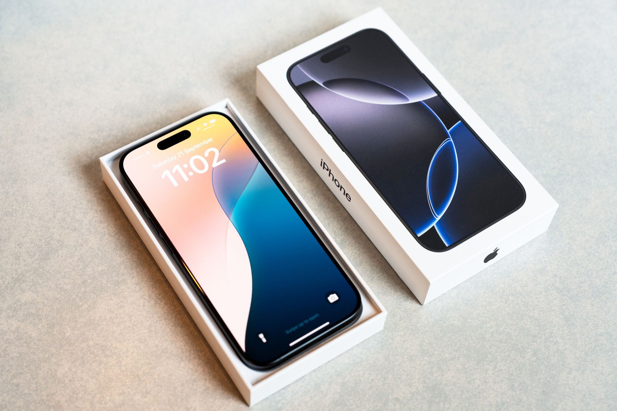 Glasgow, Scotland - Close up of an Apple iPhone 16 Pro in retail packaging. The smartphone was released in September 2024.