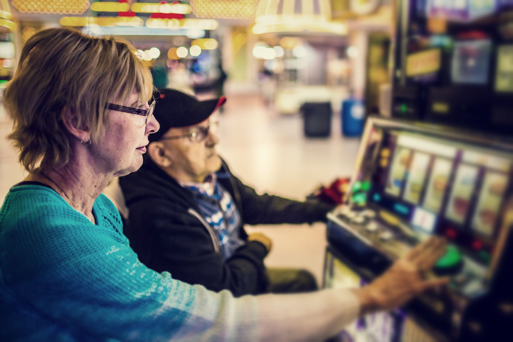 Mature couple enjoying a moment gambling.