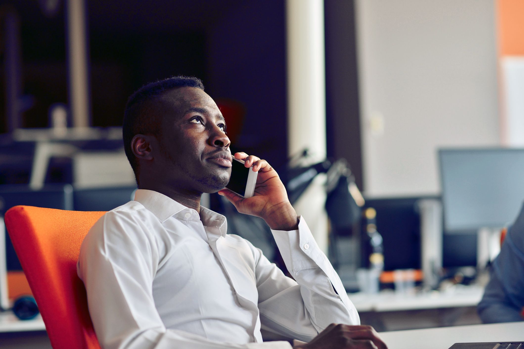 man looking irritated on phone