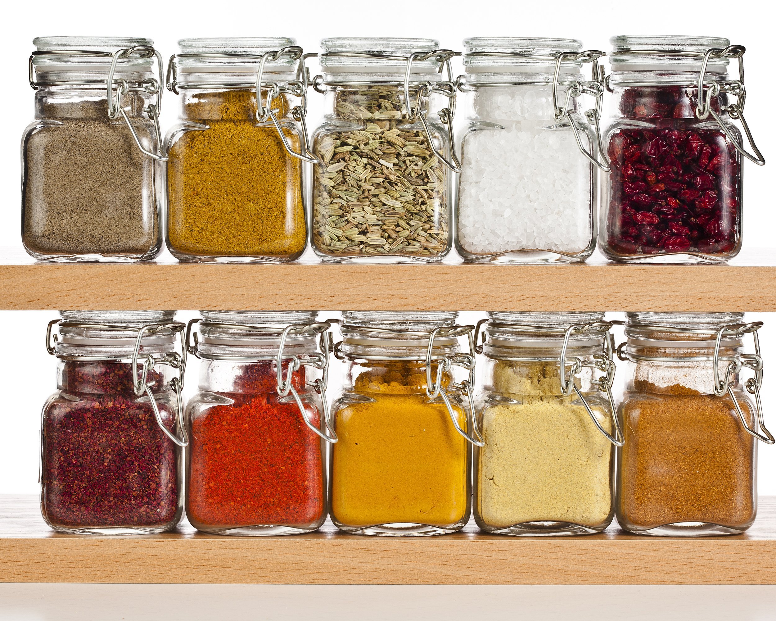 powder spices in glass bottles
