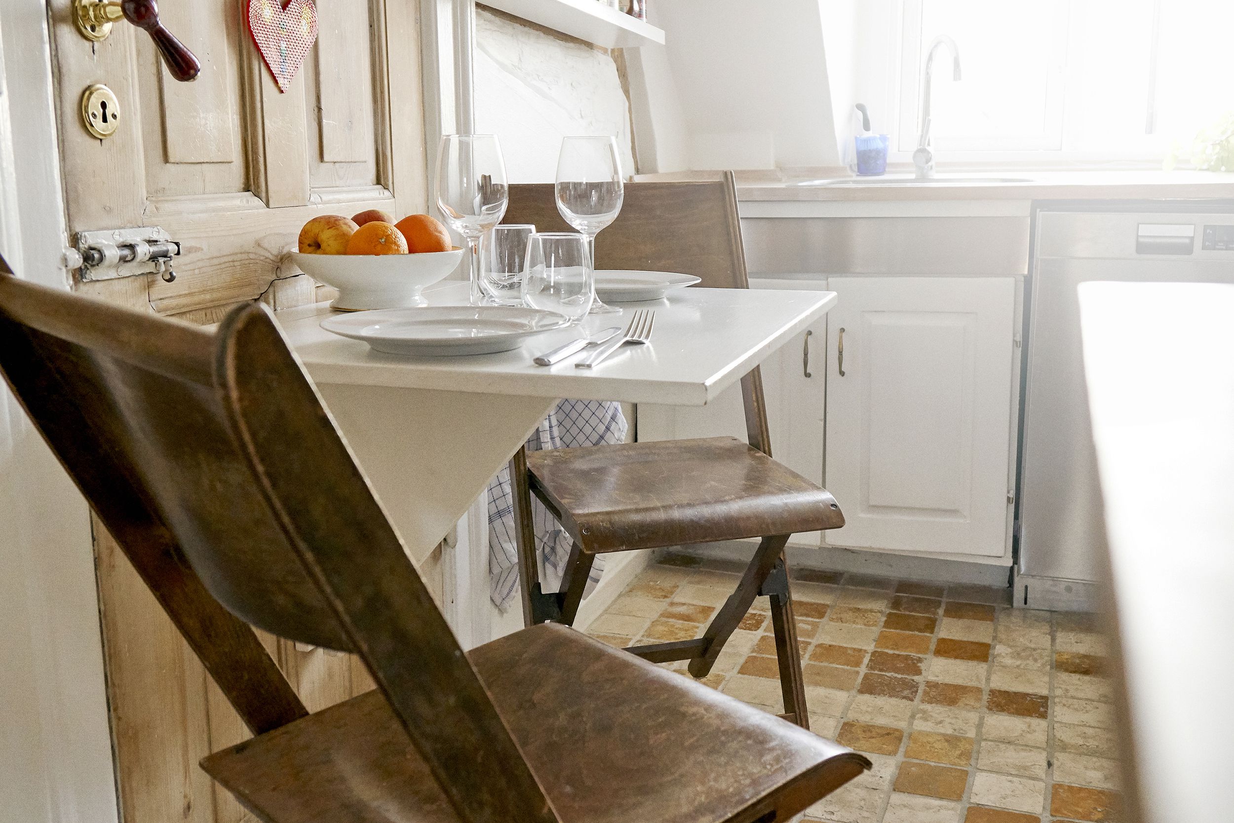 tiny eating area in kitchen of tiny condo