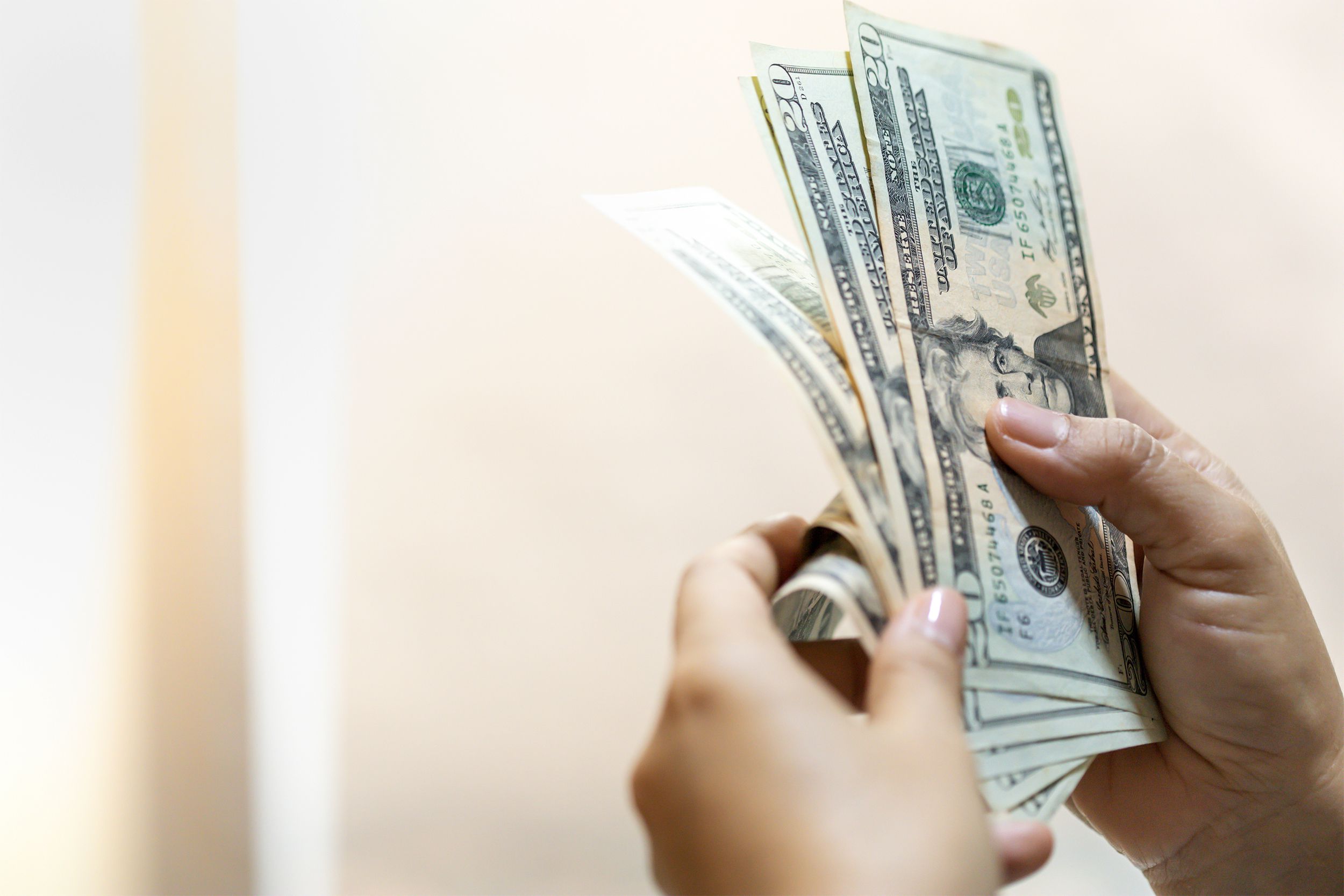 hand holding money