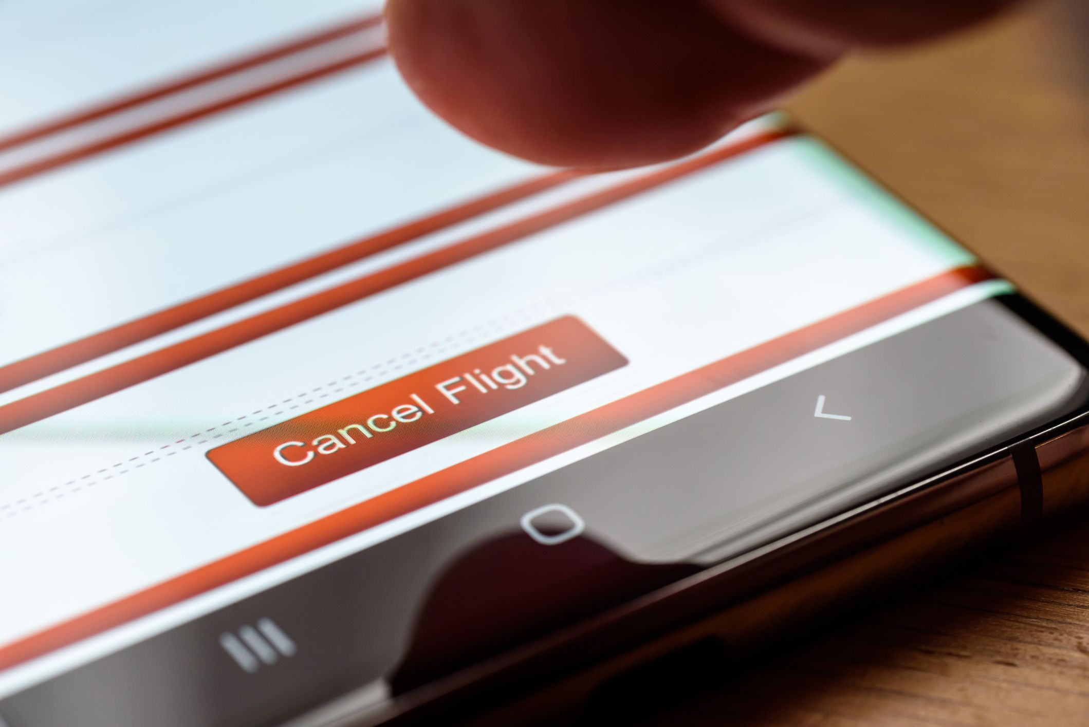 cancel flight text button on smart phone screen.