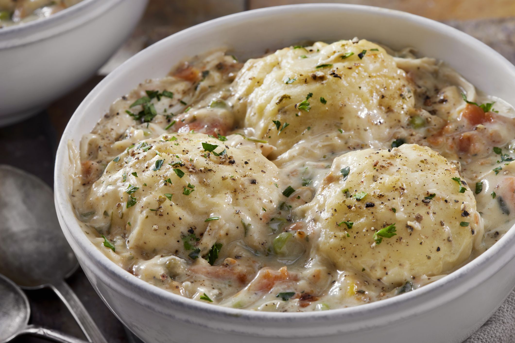 Creamy Chicken and Dumplings with Roast Chicken, Green Peas, Celery and Carrots