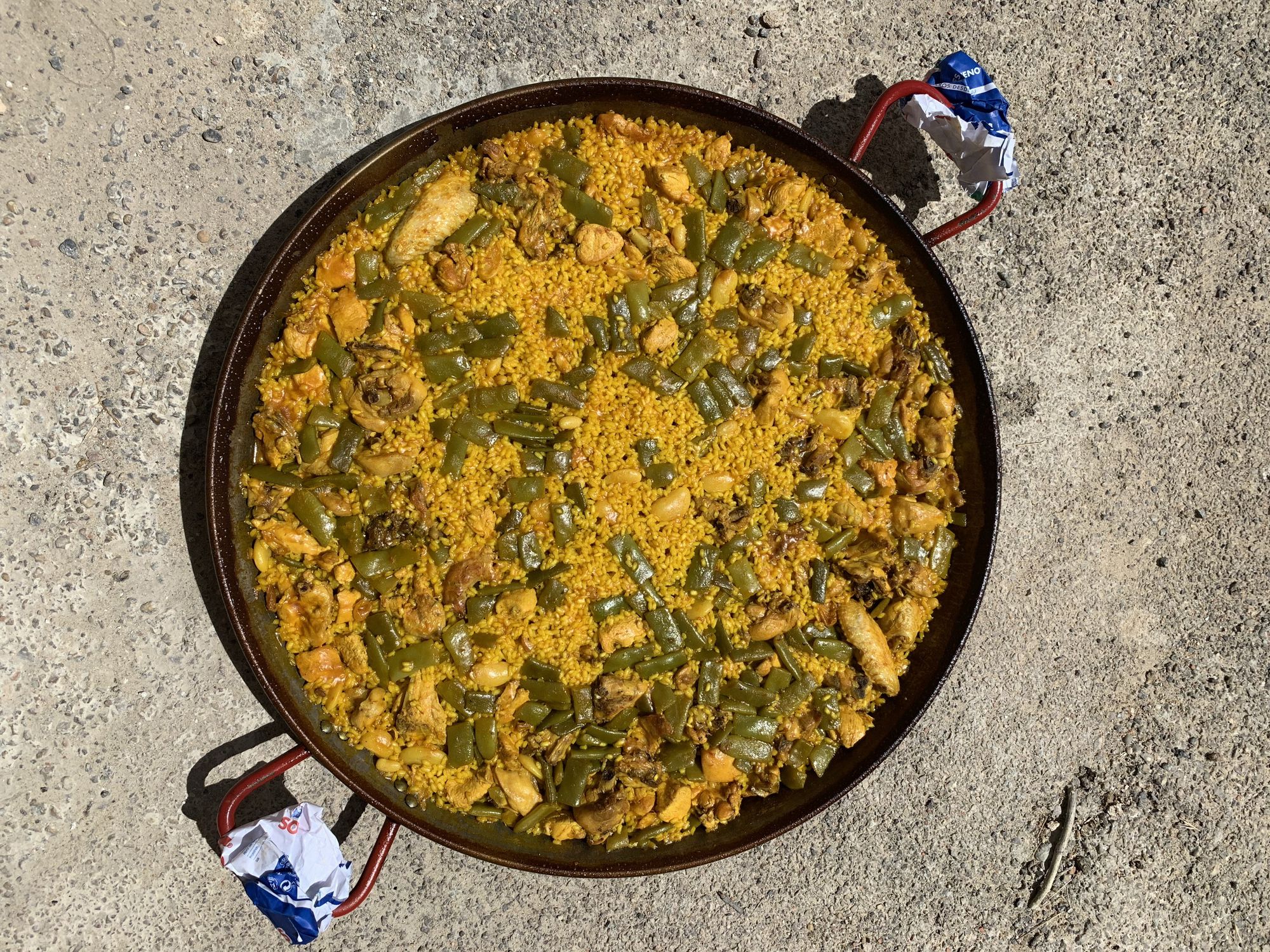 Traditional recipe for Valencian chicken and rabbit paella, Spain