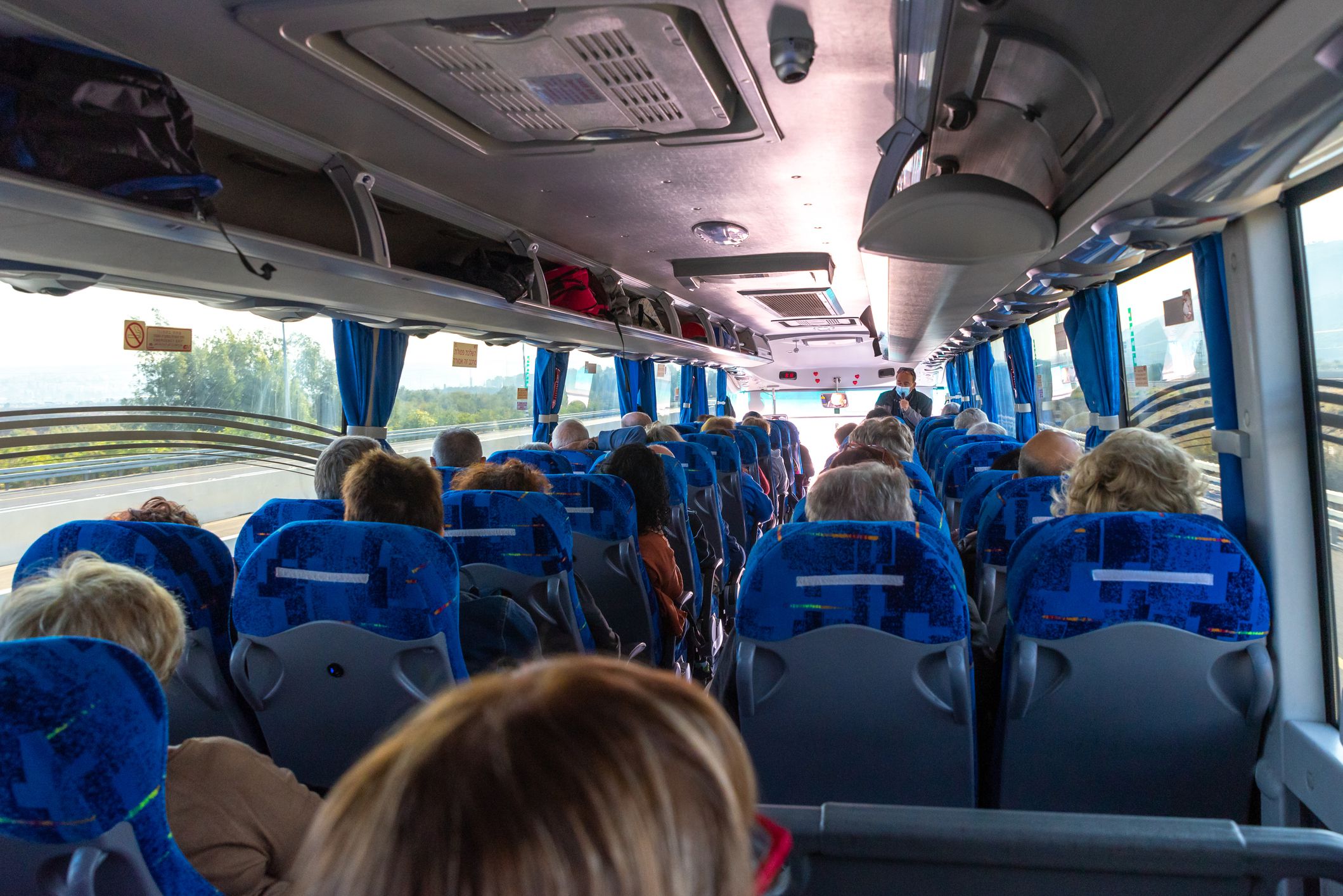 Jerusalem, Israel November 22, 2021 Older tourists and their tour bus enjoying sightseeing in Israel
