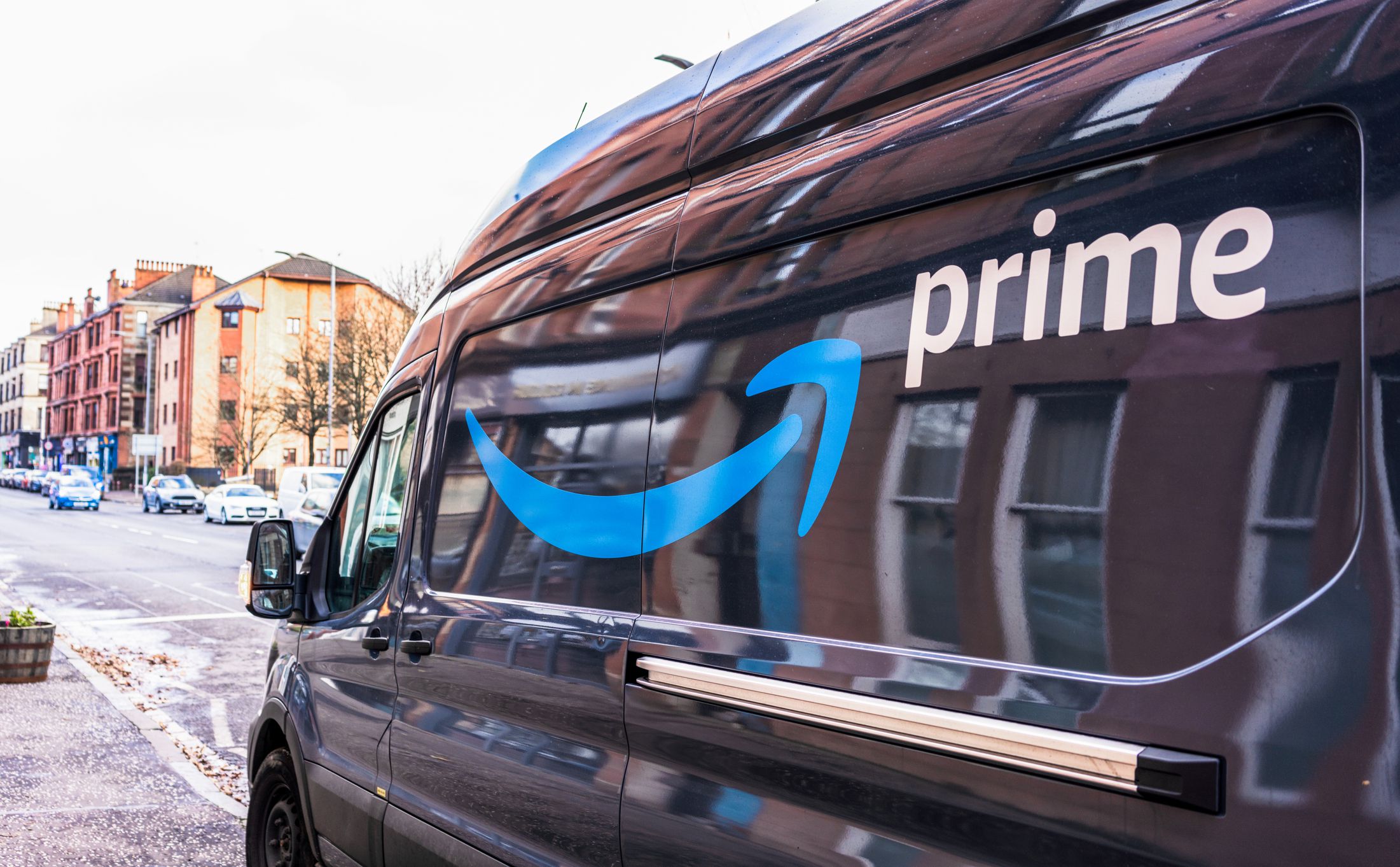 Glasgow, Scotland - The side of an Amazon Prime delivery van on a street in Partick, Glasgow.