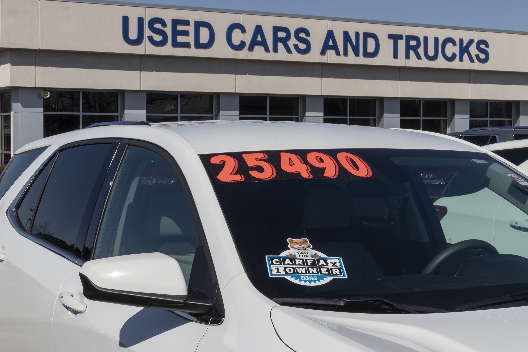 Lafayette - Circa March 2022: Carfax sticker on a used pre-owned vehicle. Carfax provides vehicle reports for prospective buyers that may reveal problems.