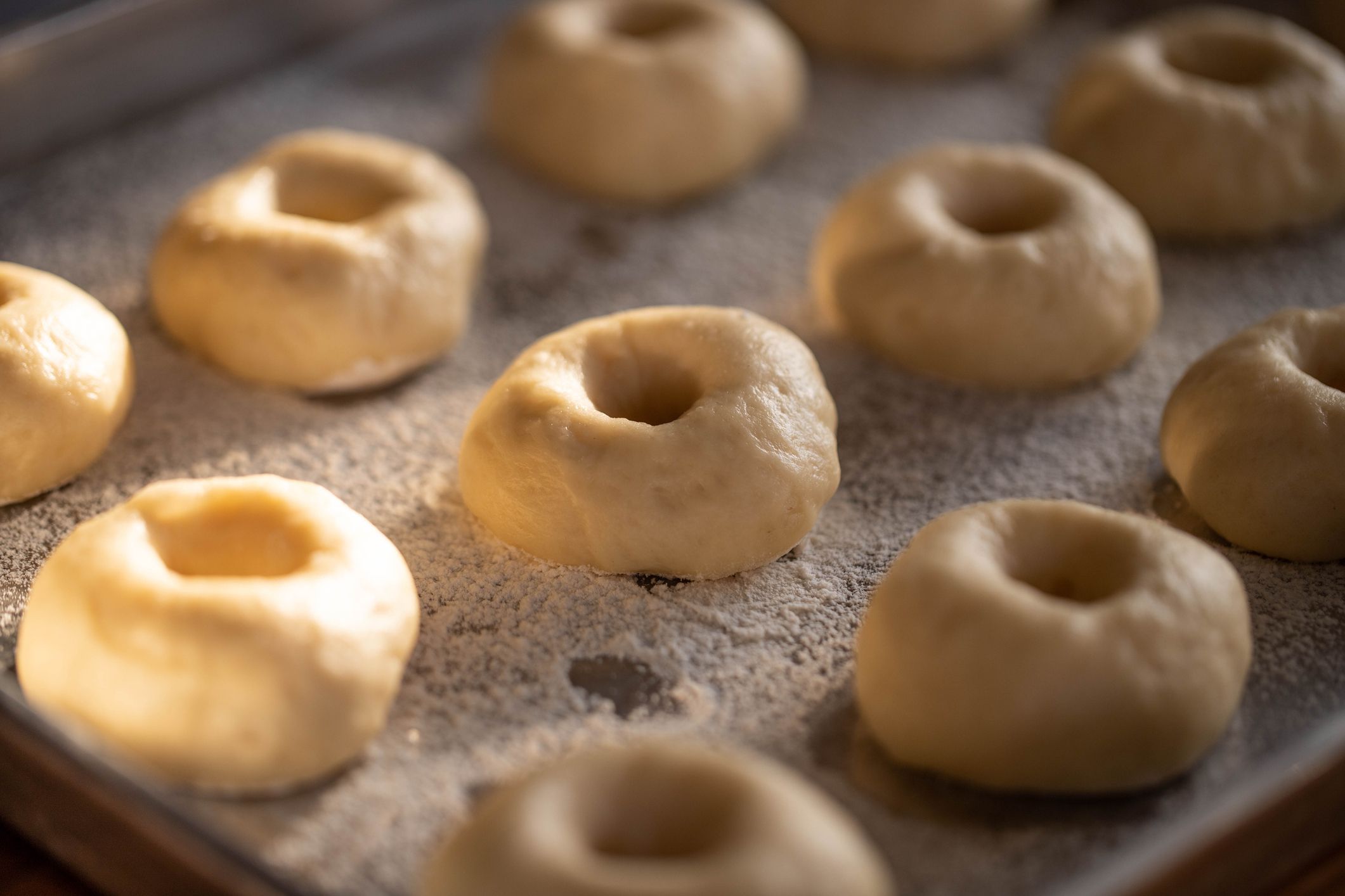 Close-Up Of Donuts Dough On Table. Preparing donutsdeep fry