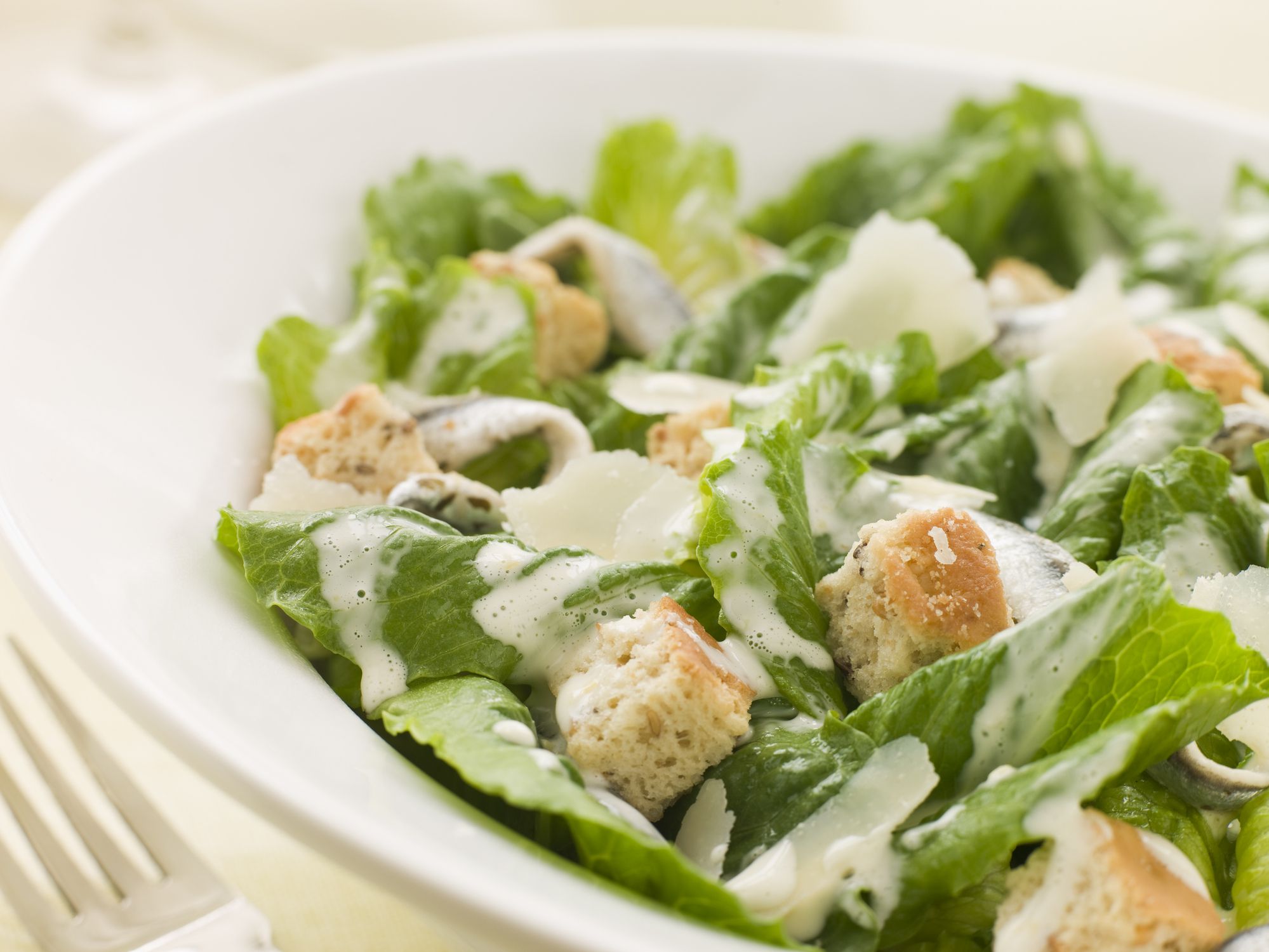 Bowl of Caesar Salad With Fork