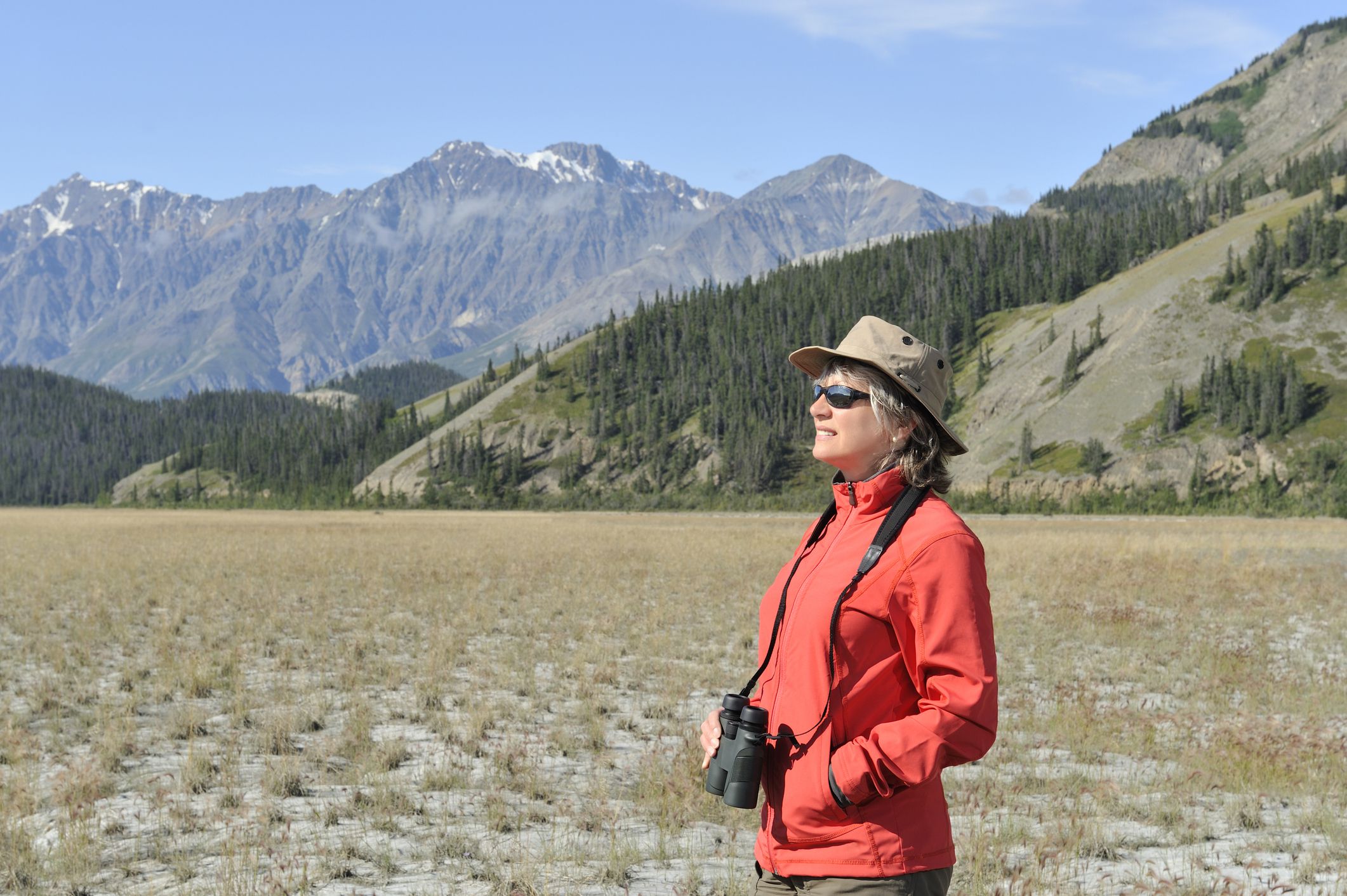 Woman exploring Yukon wild area.
