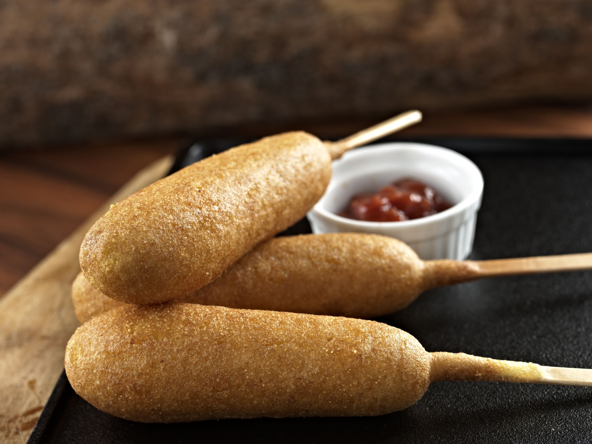 Close up of Corn Dog with Ketchup.
