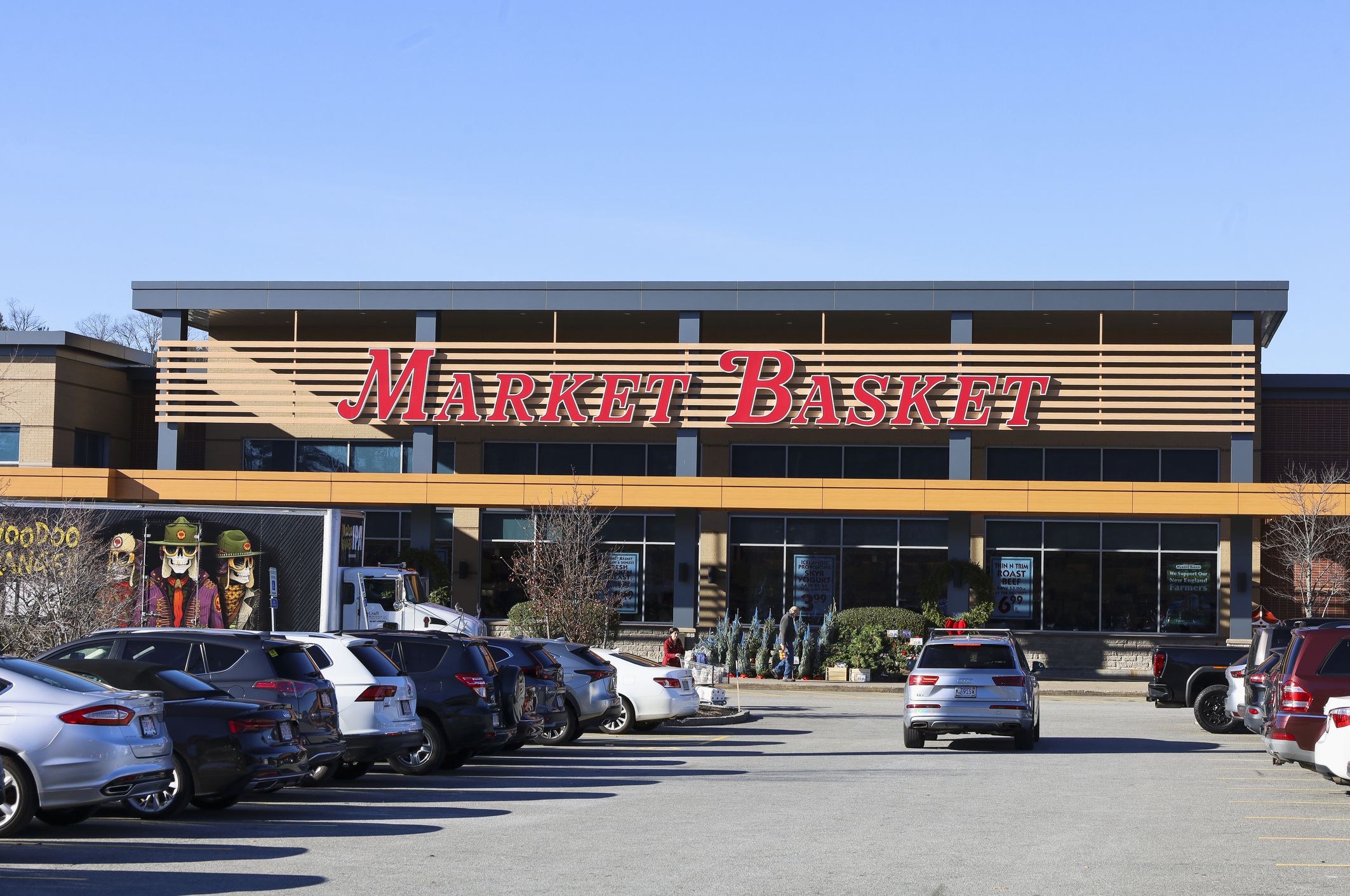 Market Basket storefront exterior and parking lot in Waltham, Massachusetts on December 4, 2024.