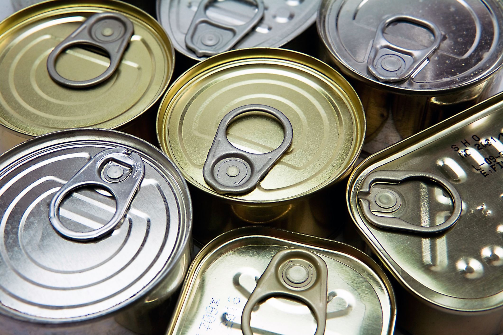 Tins of different sizes and opening