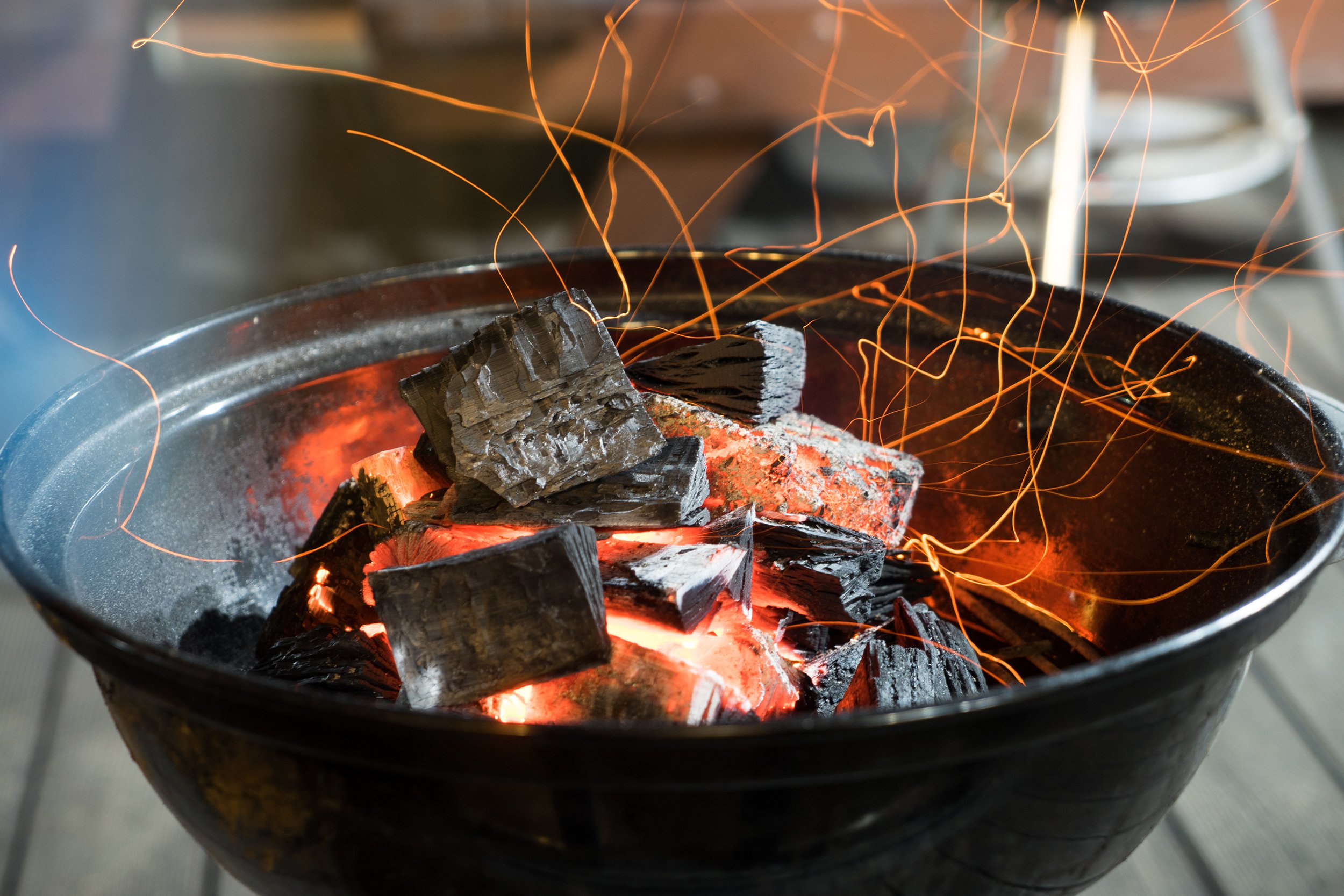 burning charcoal in camping