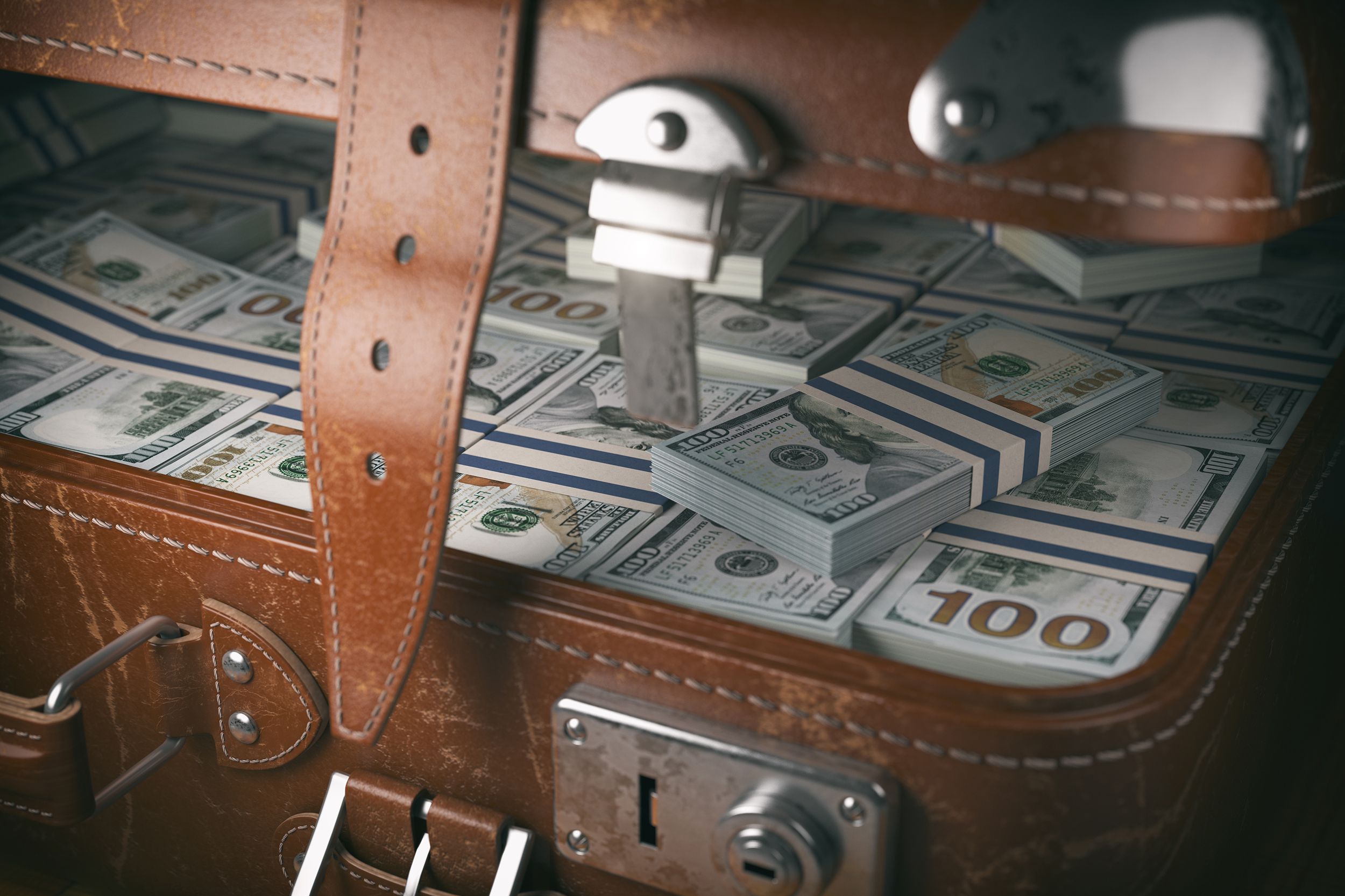 vintage suitcase full of $100 money