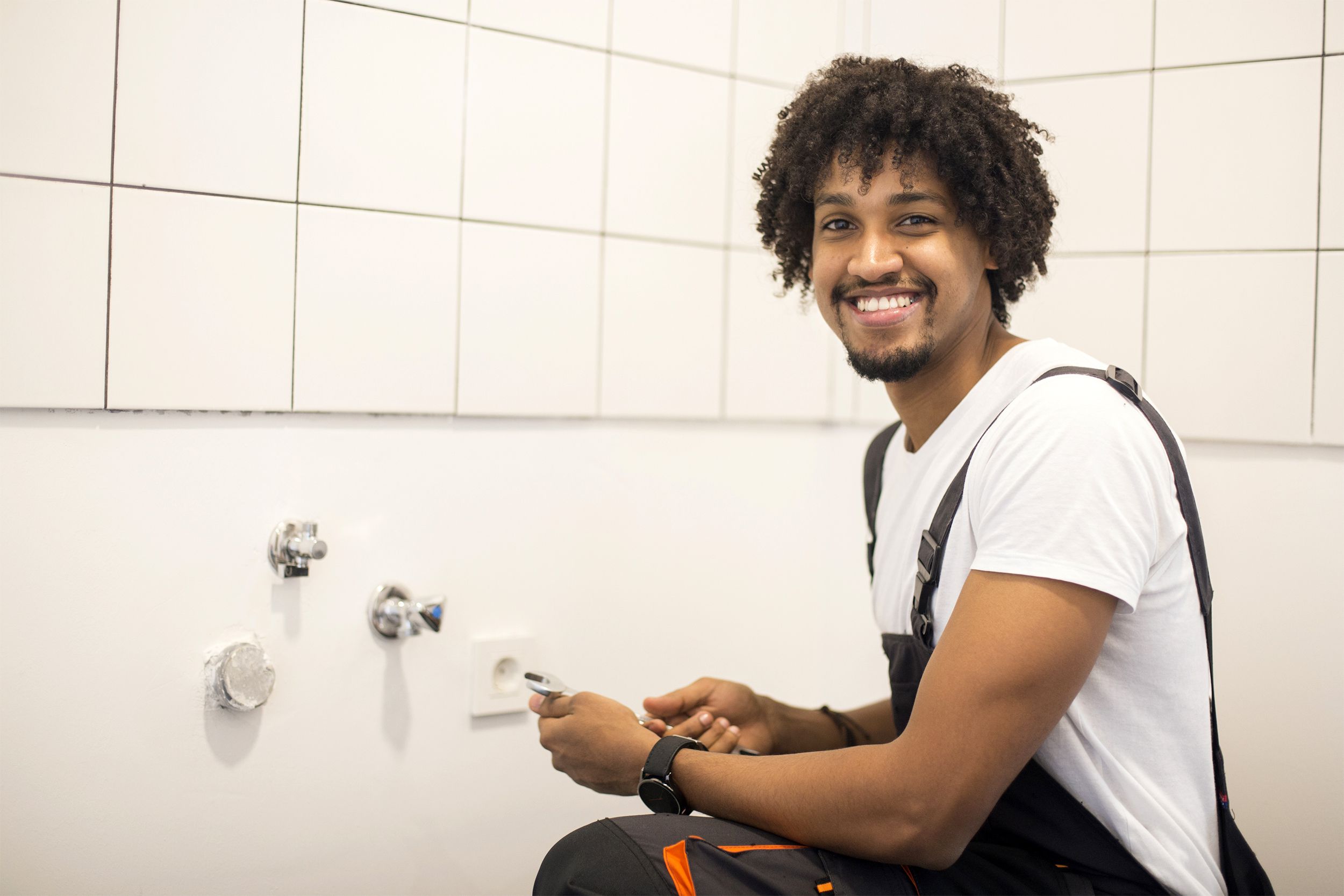 plumber in shower