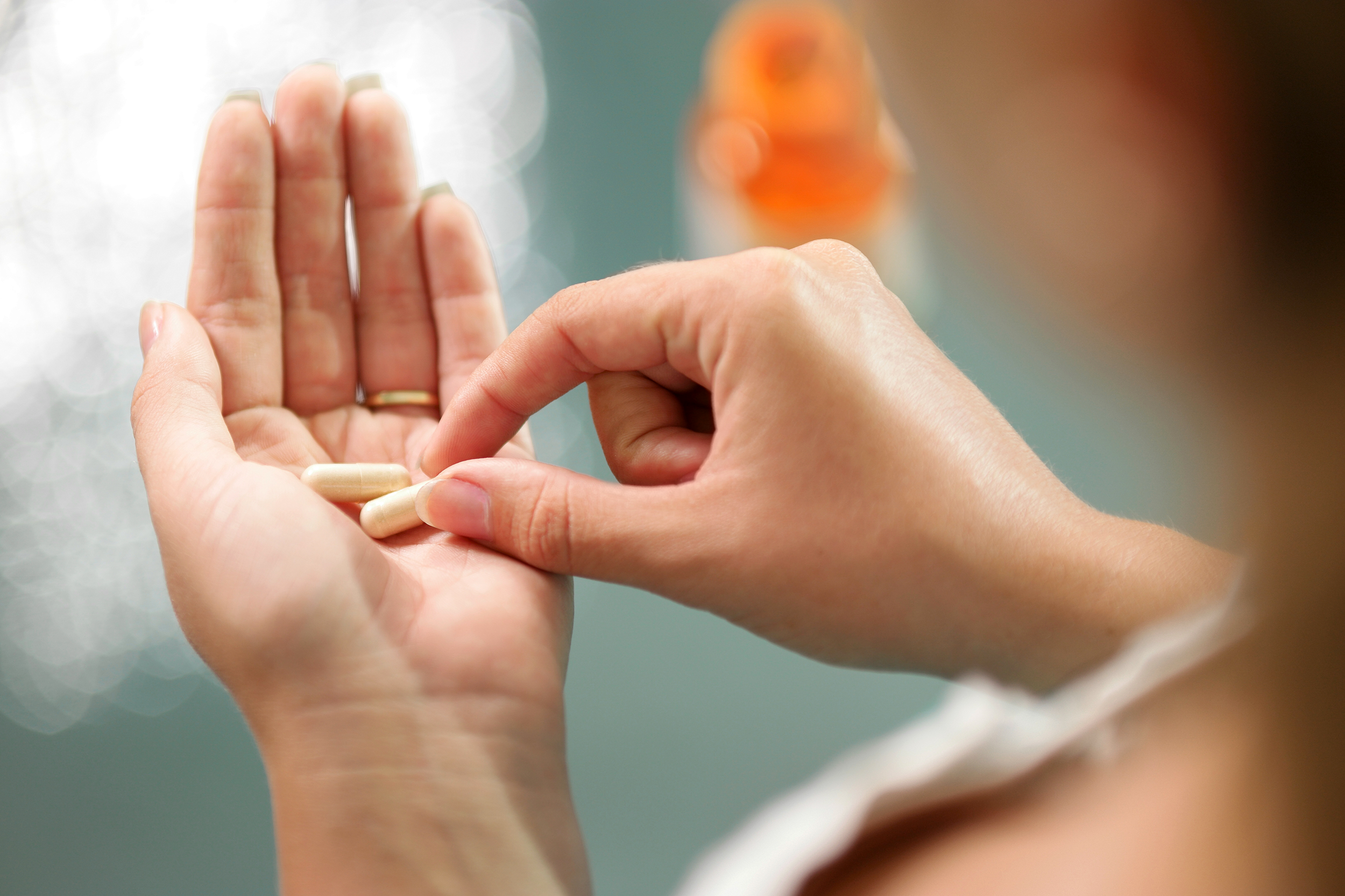 Woman taking pills